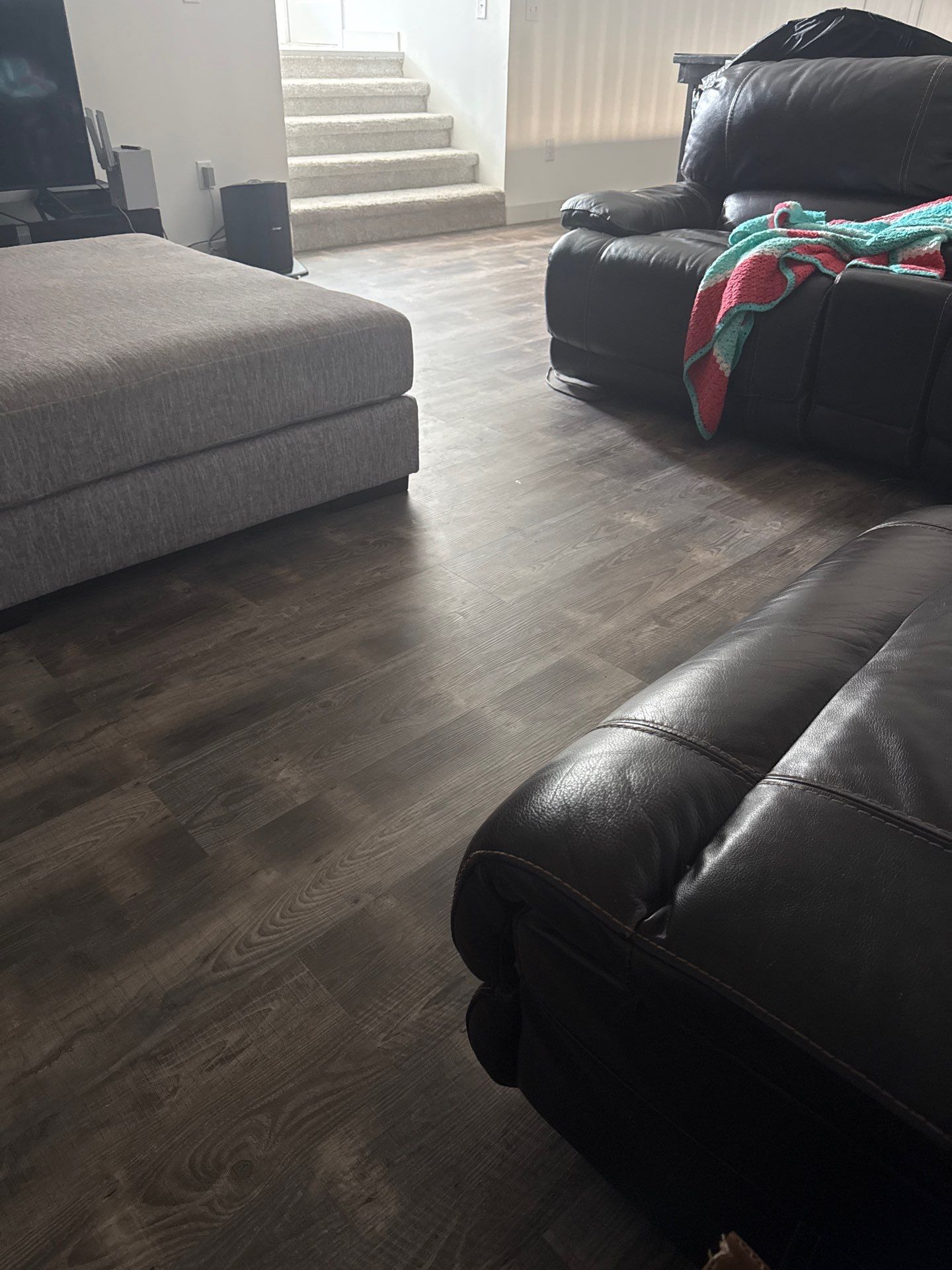 Living Room Interior Remodel with Wood-Look Plank Flooring in Scottsbluff by CompanyCam Sales Demo