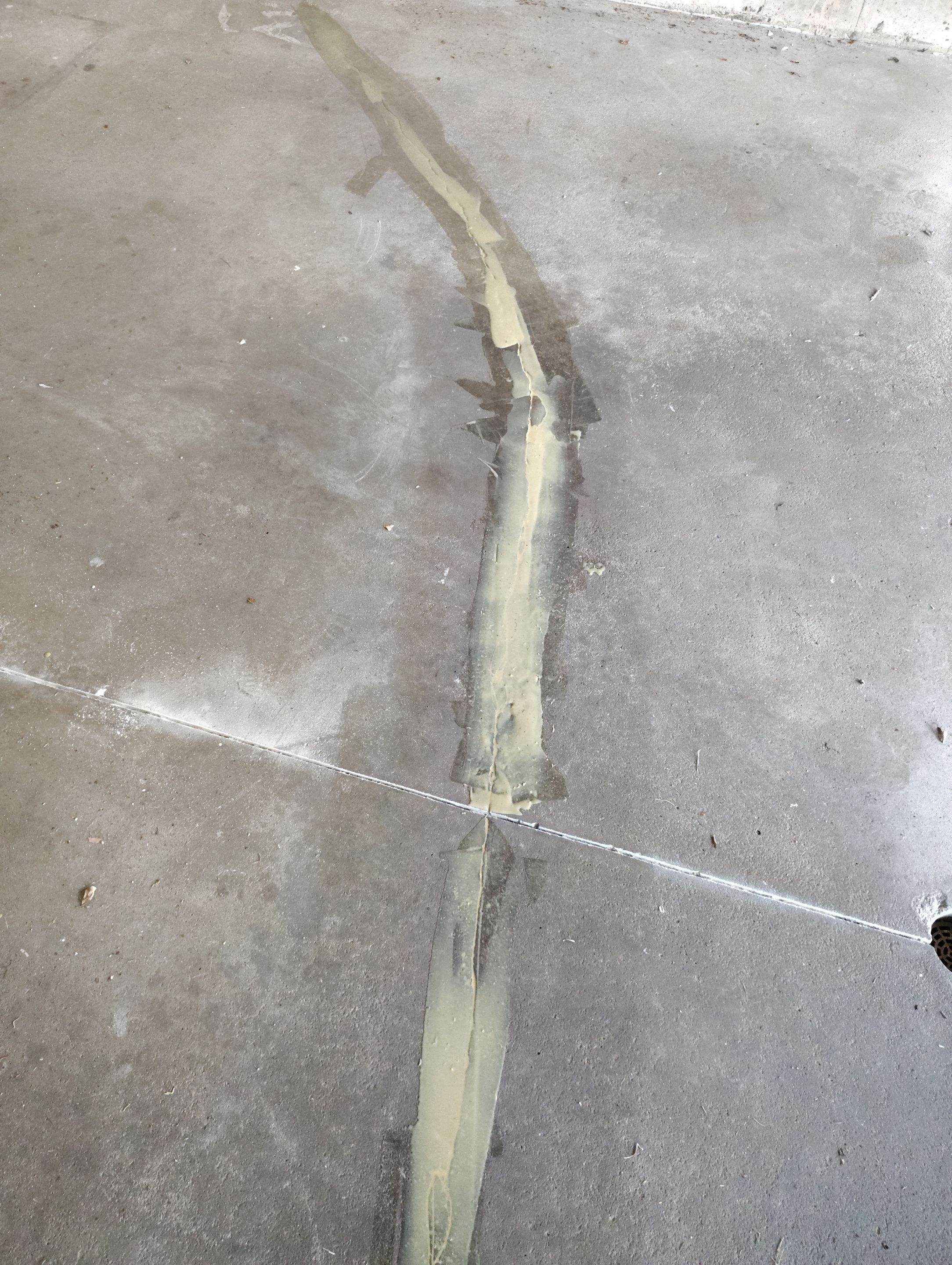 Sioux Falls Garage Concrete Repair and Epoxy Flake Floor Coating by Select Painting, Coatings & Garage Cabinets