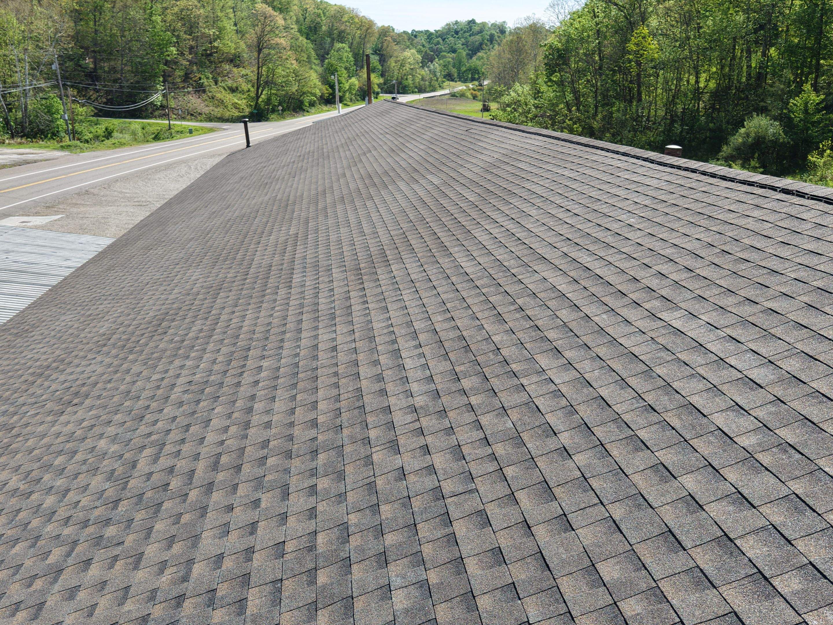 Commercial Roofing Installation using GAF Timberline HDZ Barkwood by Rainstoppers Roofing