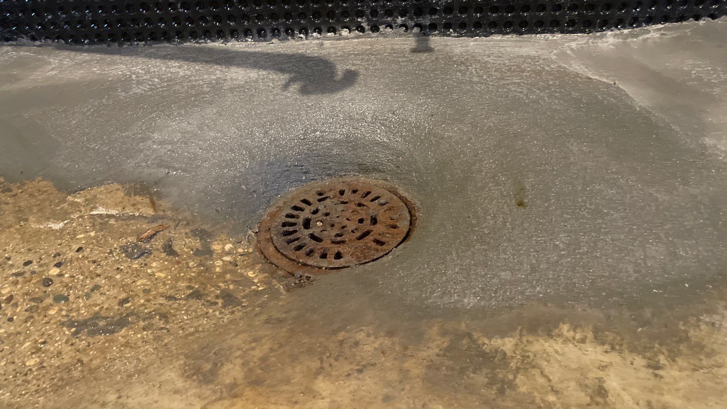 Interior Drain Tile & Buried Discharge in South Minneapolis by Waterproofing Northeast
