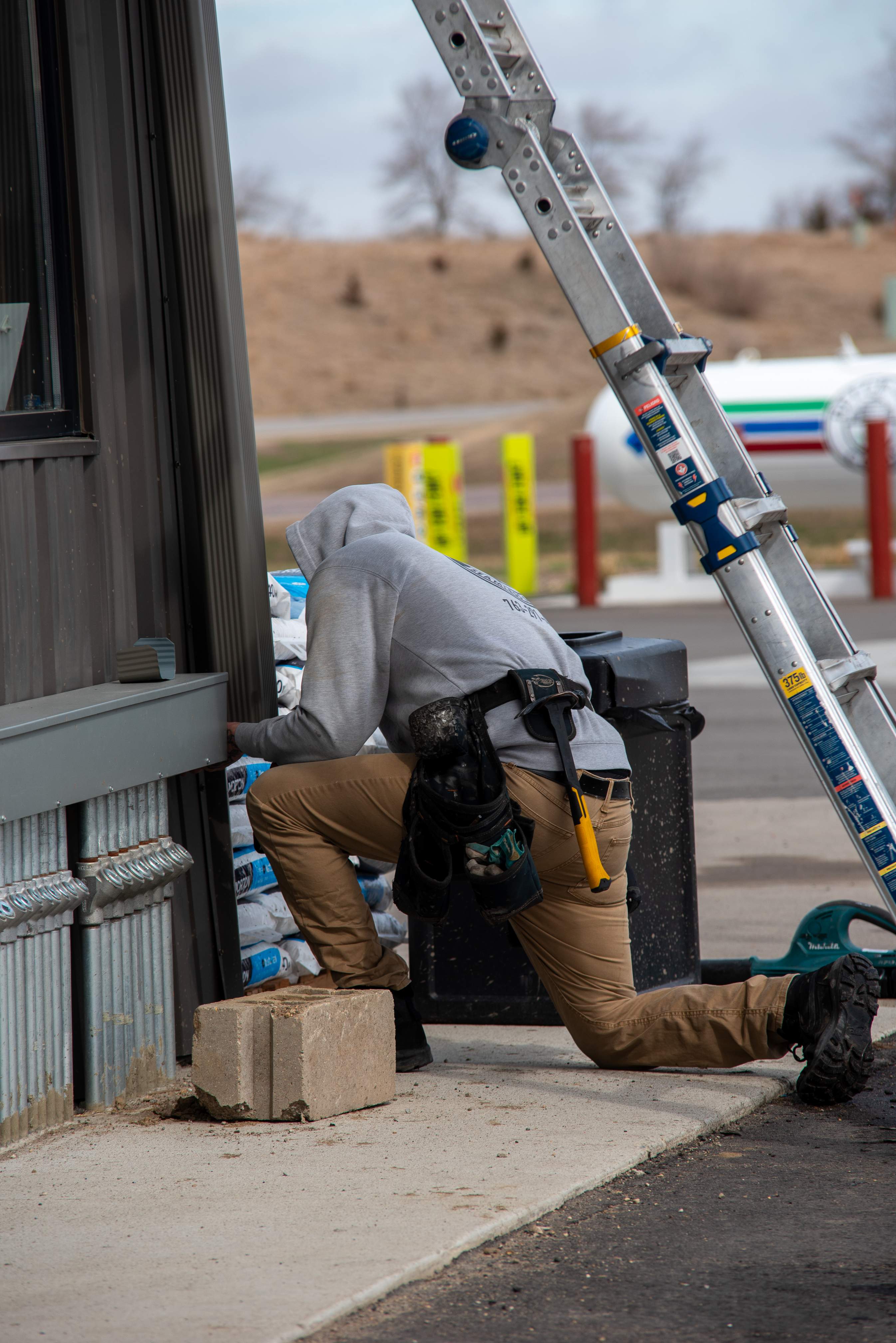 Commercial Gutter Repair in New London MN | Reseaming Gutters & New Downspouts by Next Level Seamless Gutters / Exteriors Inc.