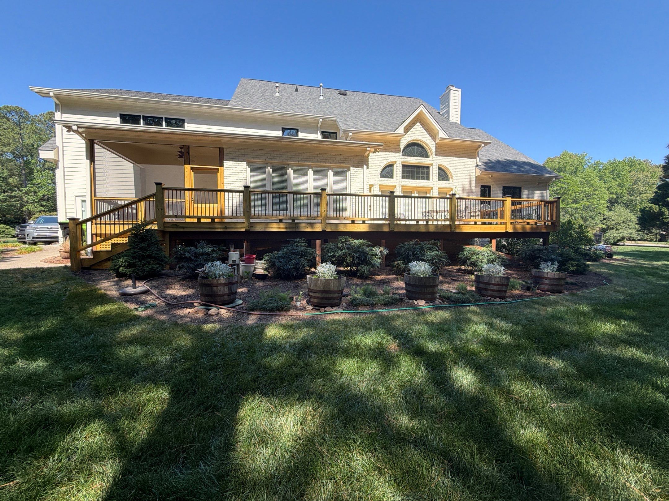 Deck Stain, Round Balusters & Screened Porch Transformation by Billy Weatherspoon Contractor