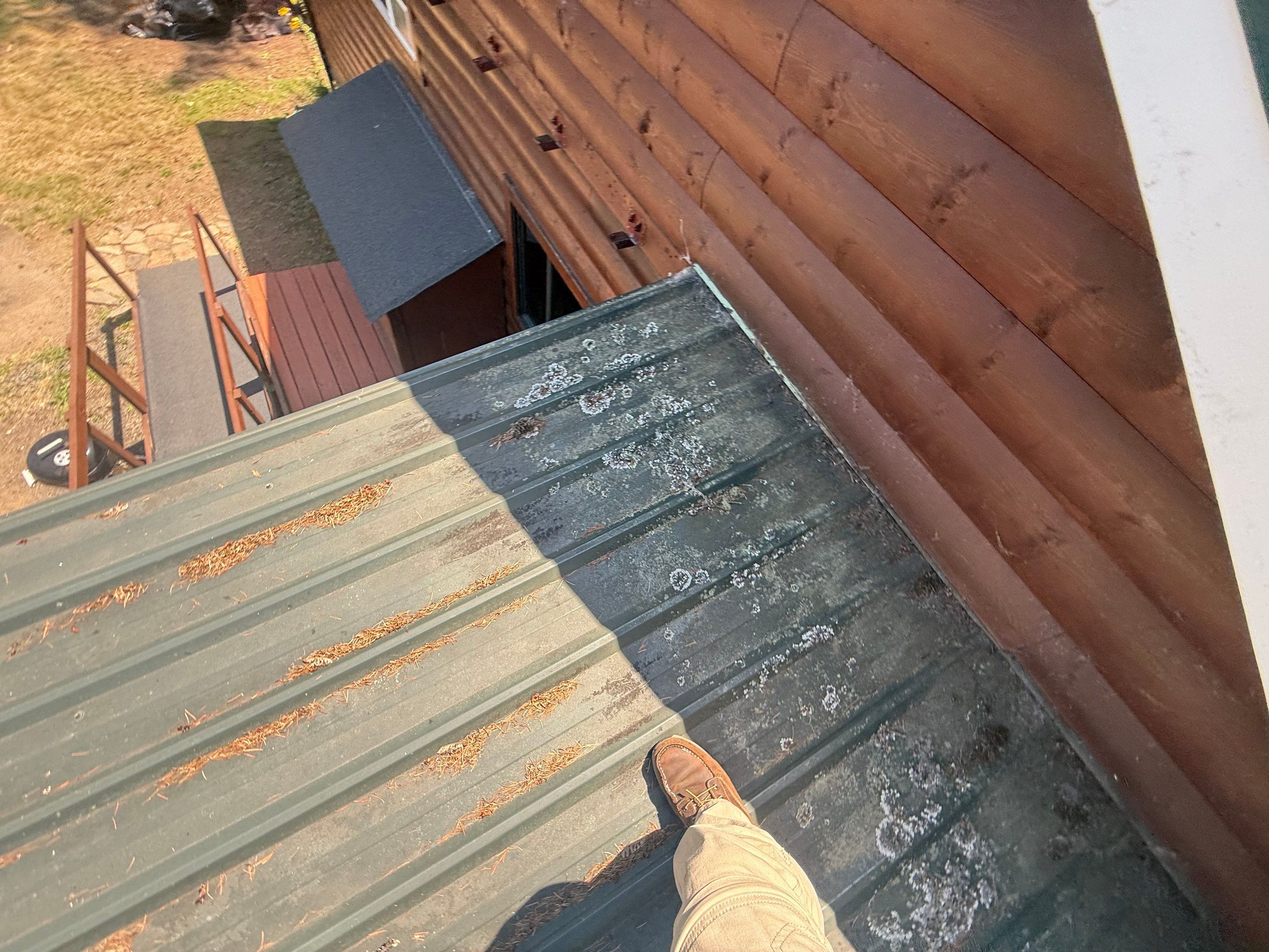 Log Cabin Metal Roof Repair and Skylight Maintenance in Springfield by BEST Roofing & Waterproofing