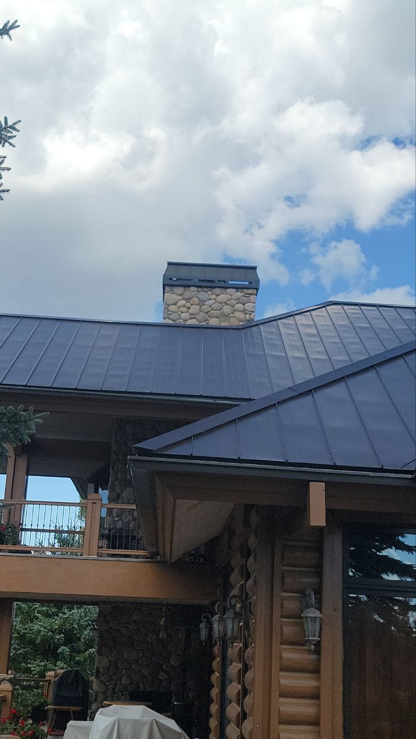 Standing Seam Metal Roof Replacement After Snow Damage by ASAP Roofing & Restoration