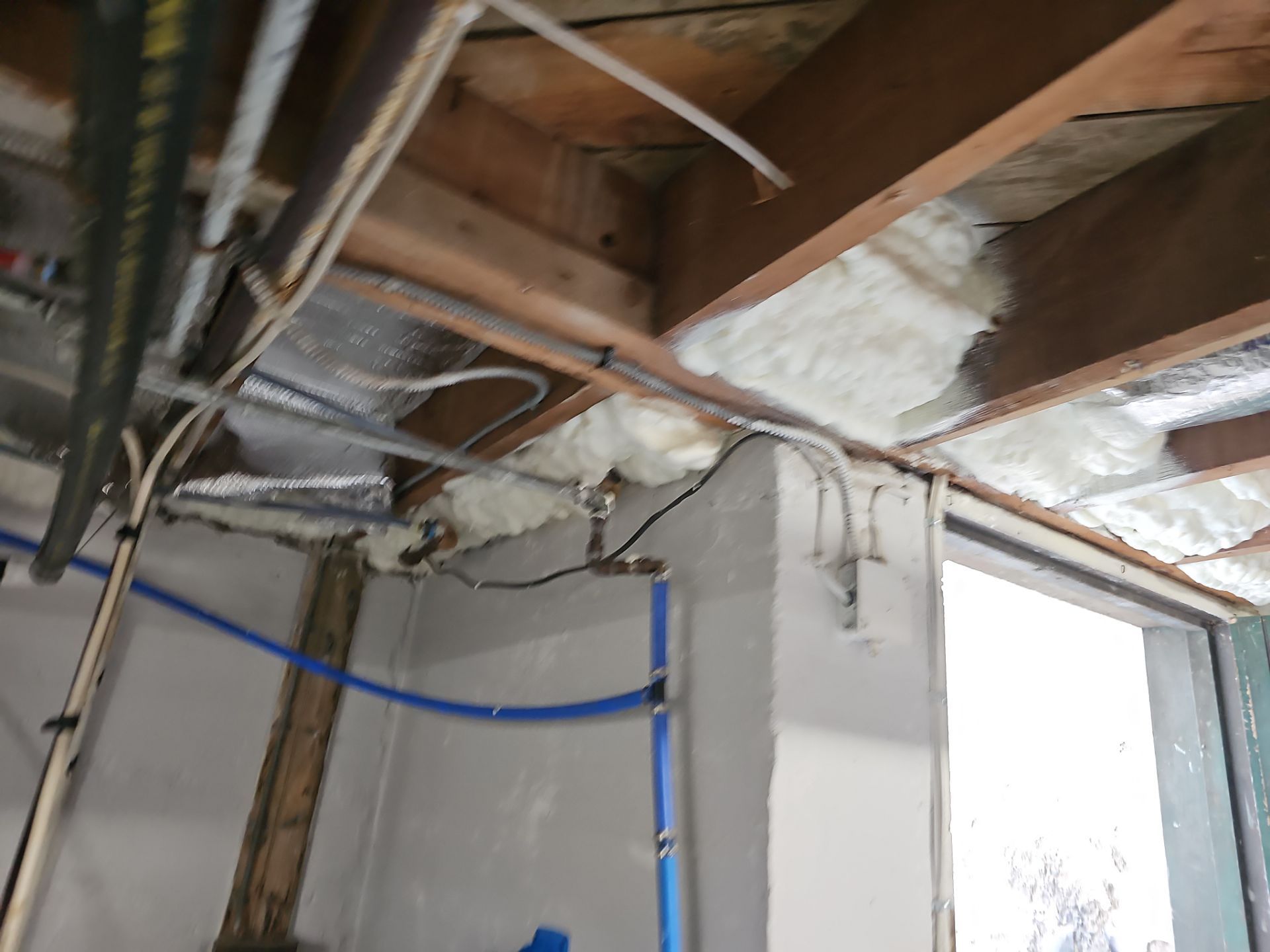 Attic Insulation using open cell spray foam by NYS Foam & Energy