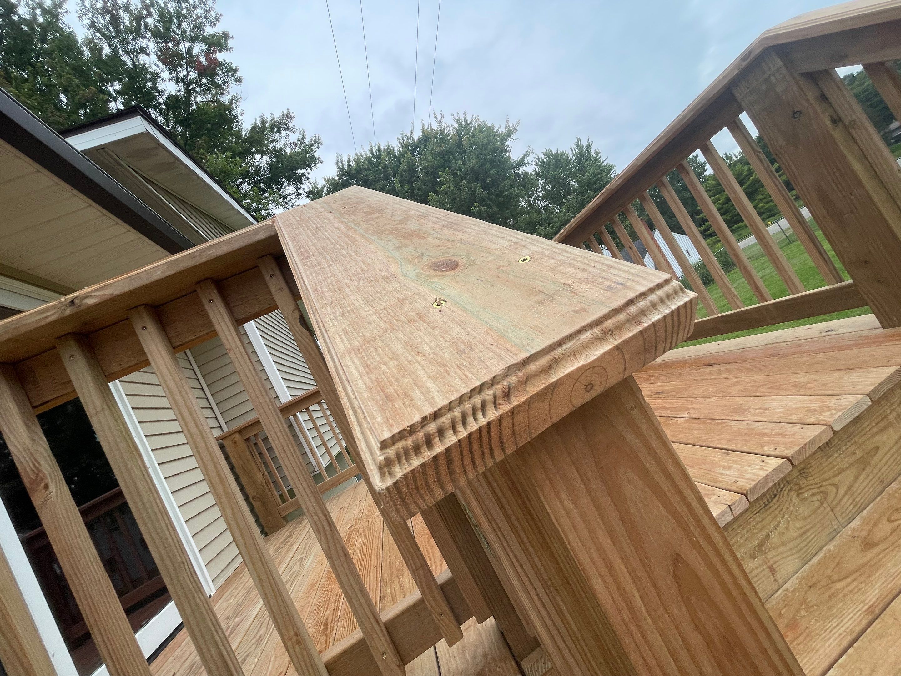 Deck Installation using Treated Lumber by Avalon Roofing and Exteriors