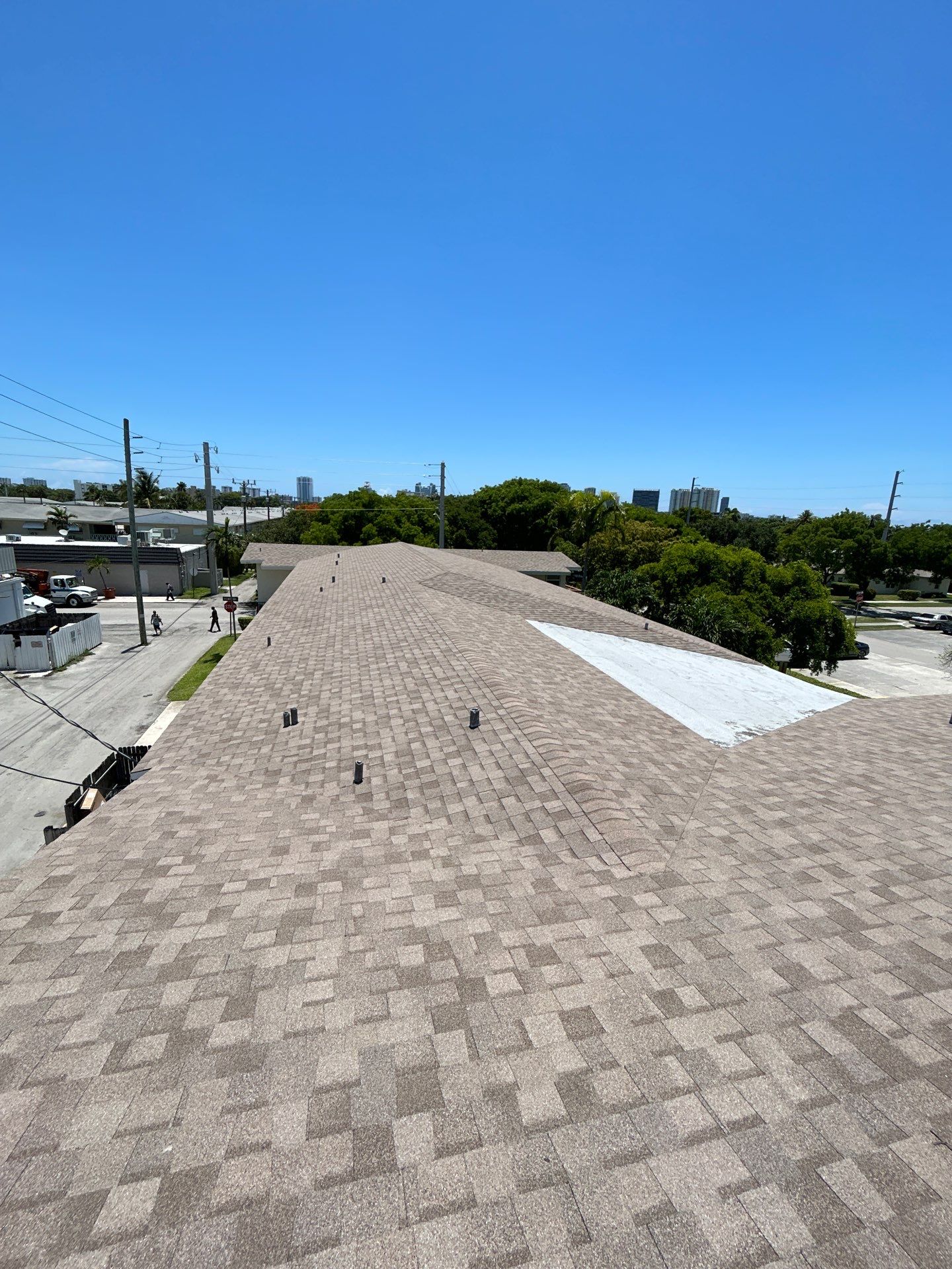 Commercial Roofing Installation using CERTAINTEED LANDMARK AR (SUNRISE CEDAR) by Earl W. Johnston Roofing 