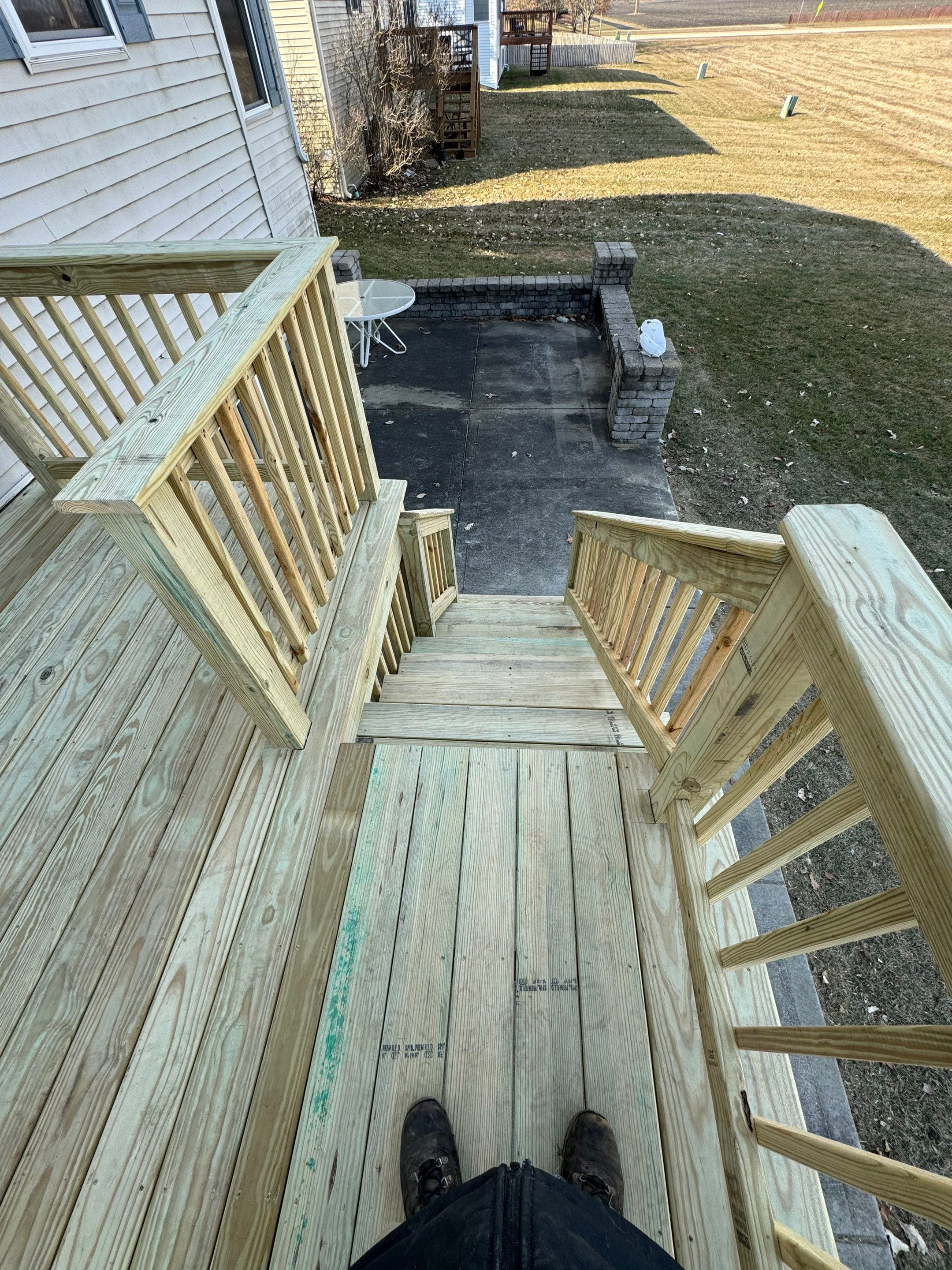 Deck Resurface with Treated SYP by Two Brothers Residential Maintenance