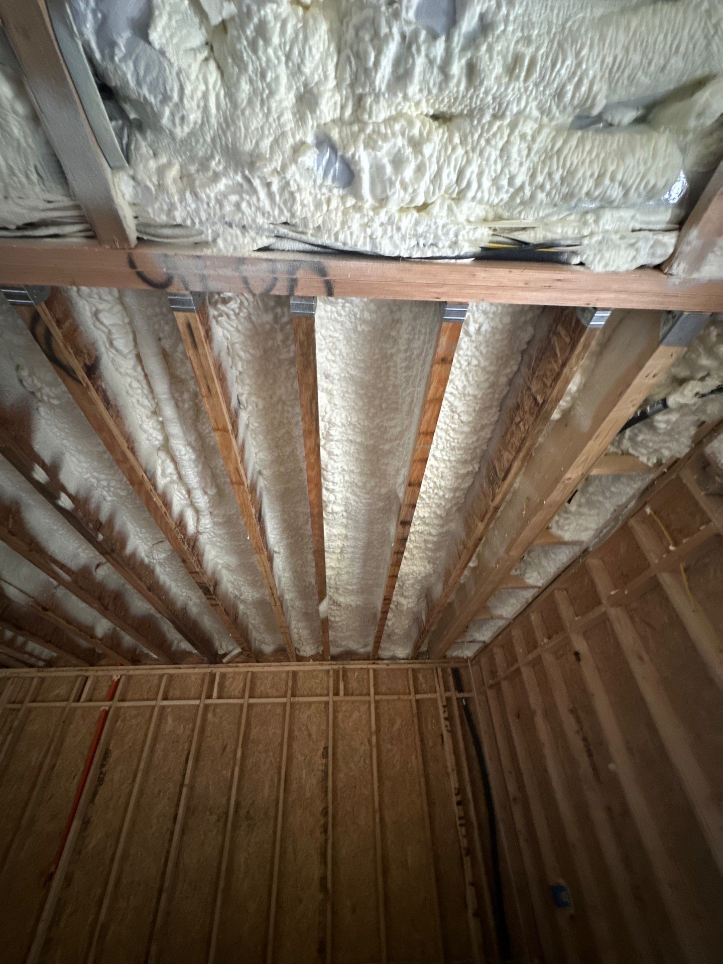 Full encapsulation with open cell spray foam on this custom home in Dallas by Apex Insulation Solutions