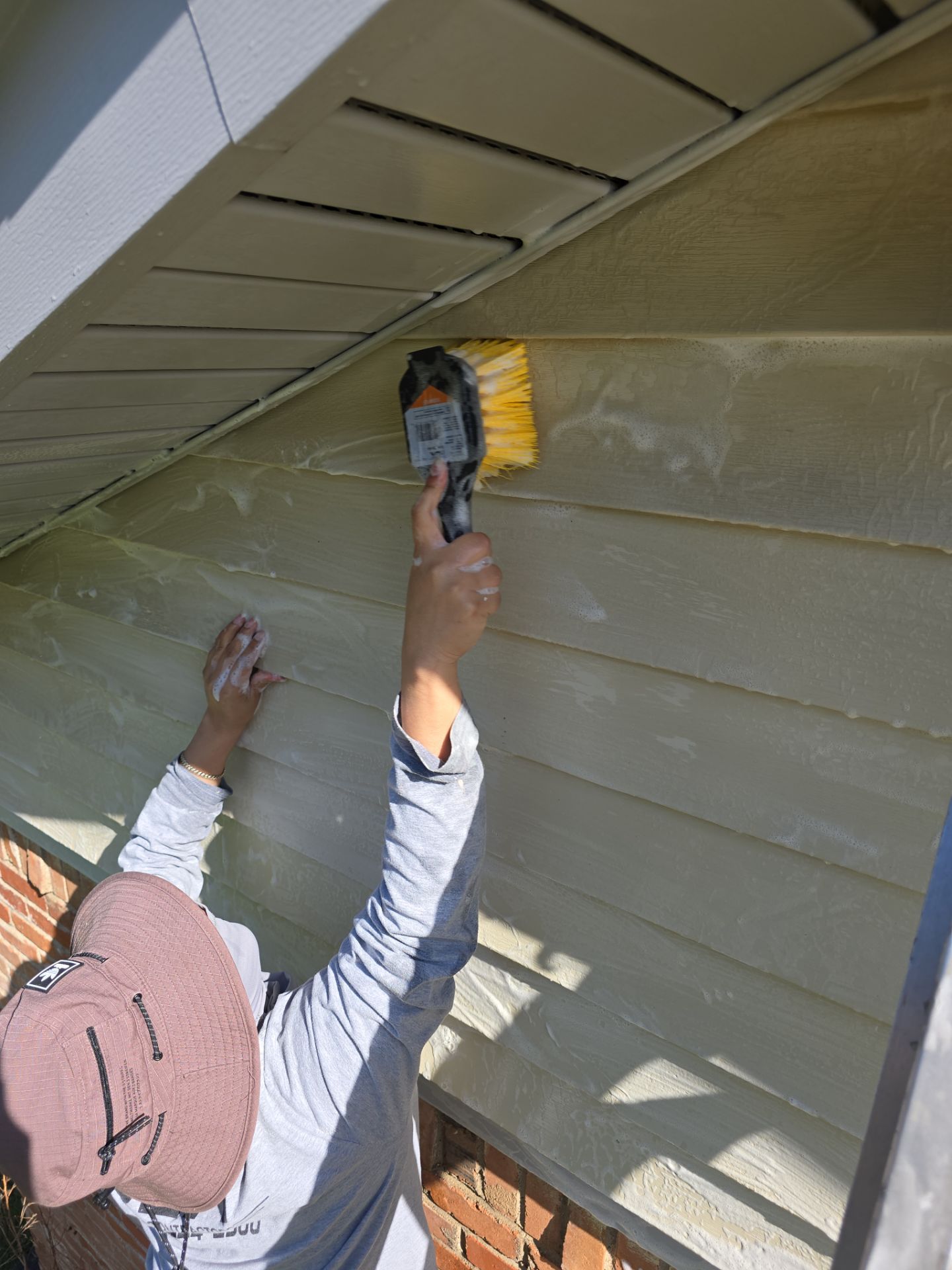 Exterior Home Paint Project with Different Surfaces by SLM General Contractors & Roofing