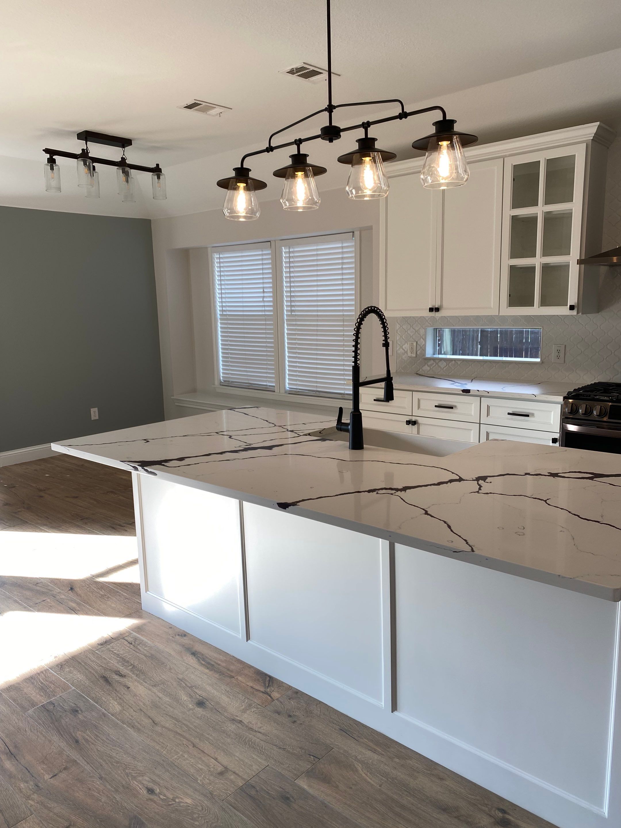 Custom cabinetry Kitchen Remodel by SLM General Contractors & Roofing