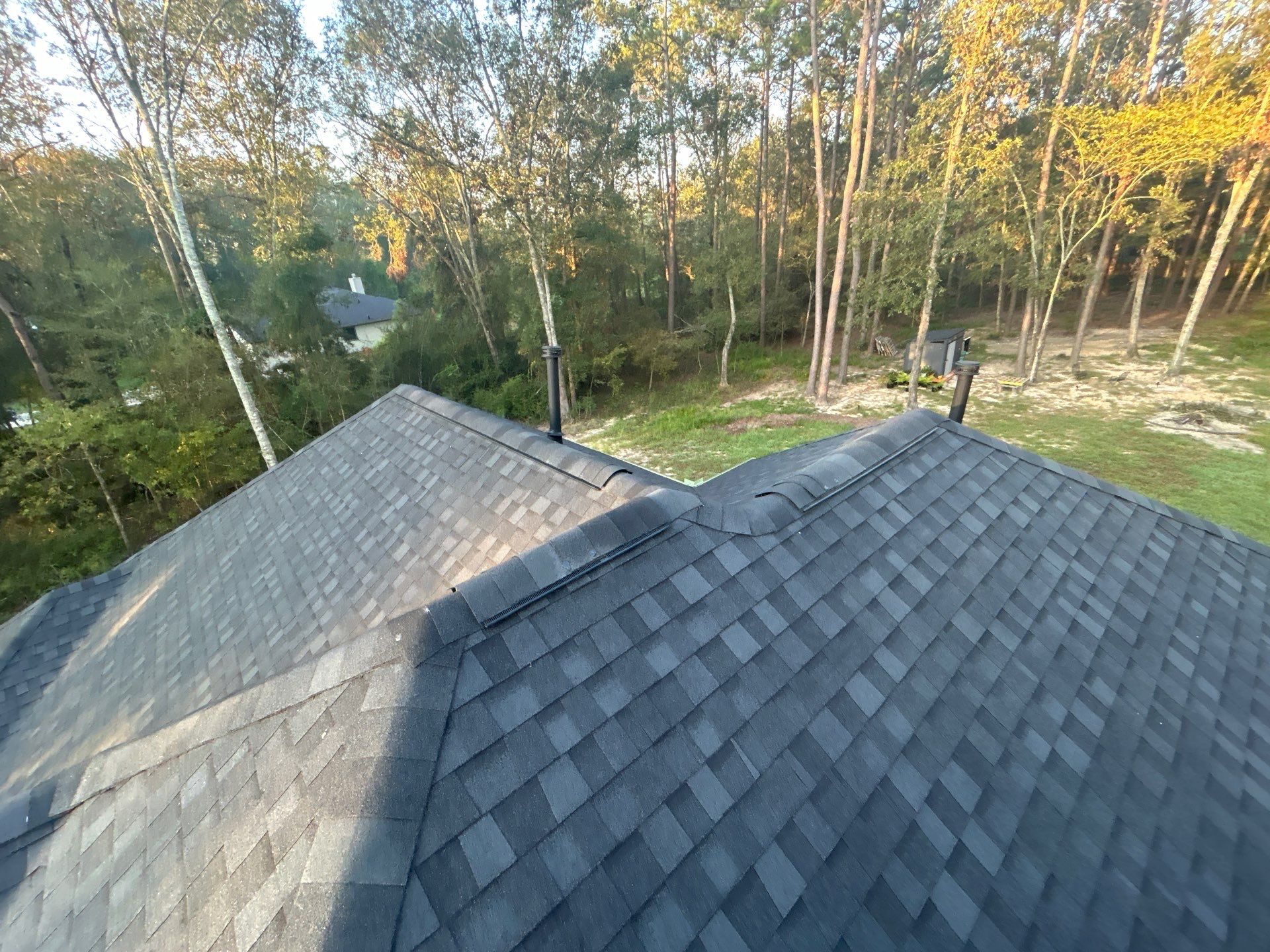 TAMKO Titan XT Rustic Black by STX Roofing