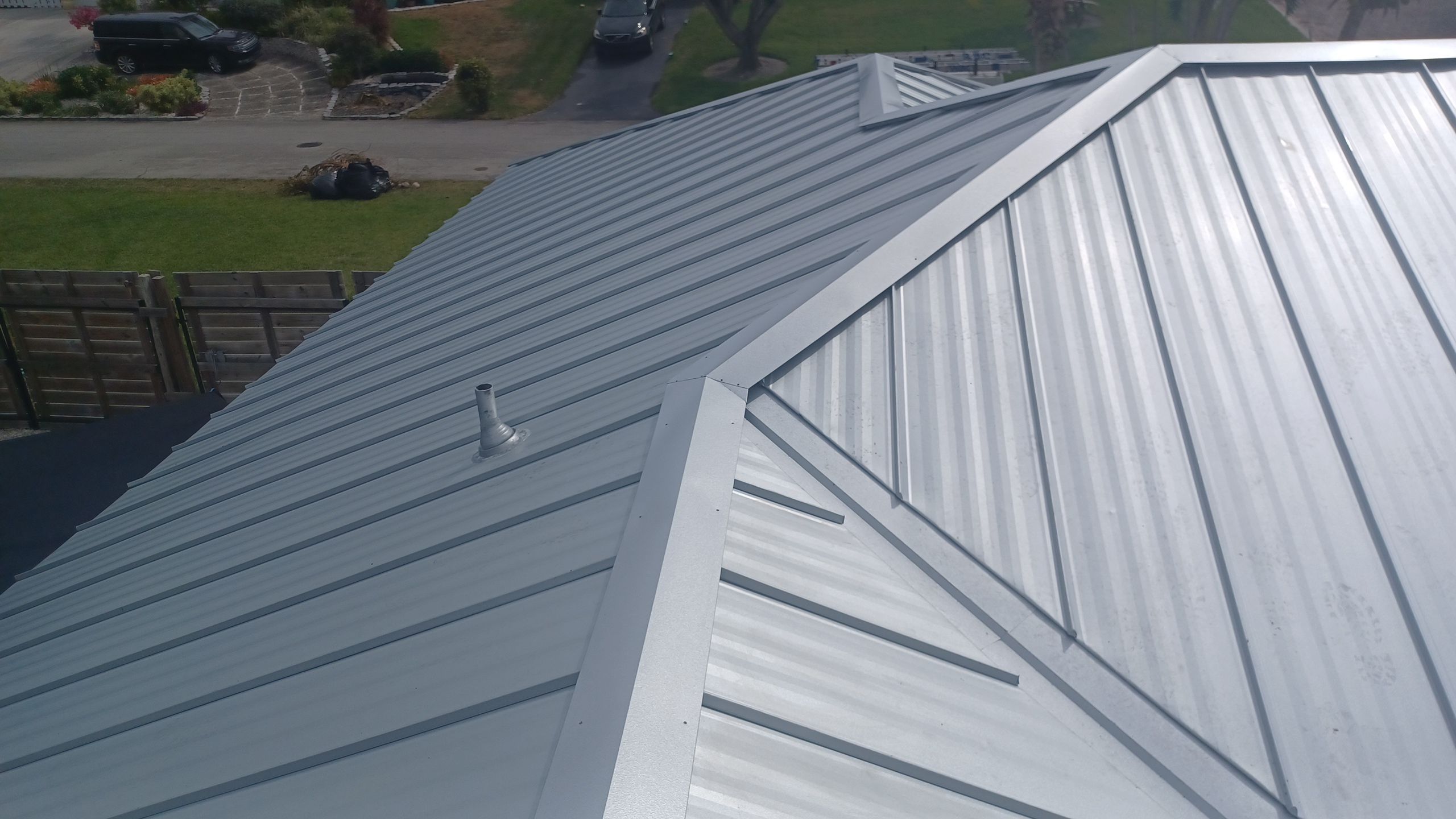 Residential Roofing Installation using 1" Nail strip metal roof by BLUES BROTHERS ROOFING