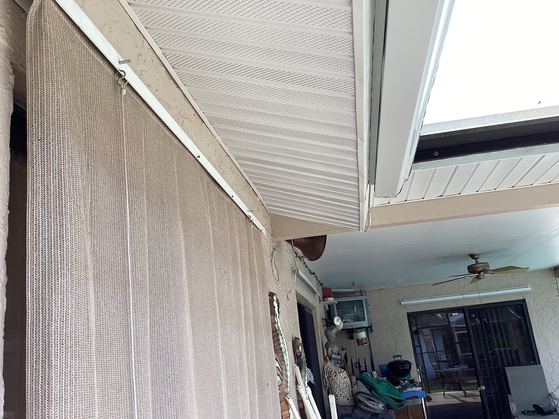 White Seamless Gutters and Splash Guards in Fort Myers FL by Gutter Professor by Gutter Professors
