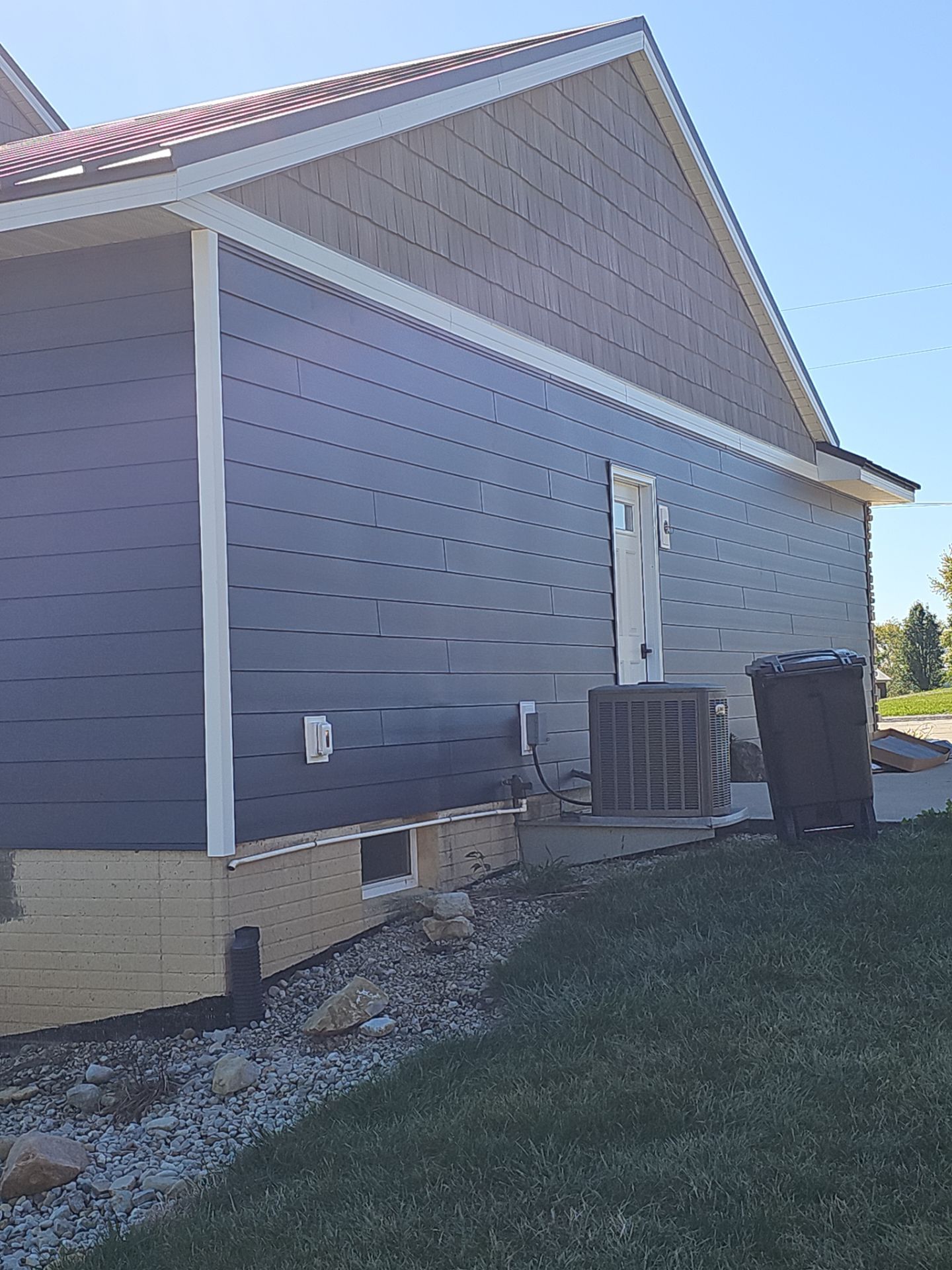 Jackson Center -Roof/Siding Replacement by Nitro Roofing and Construction