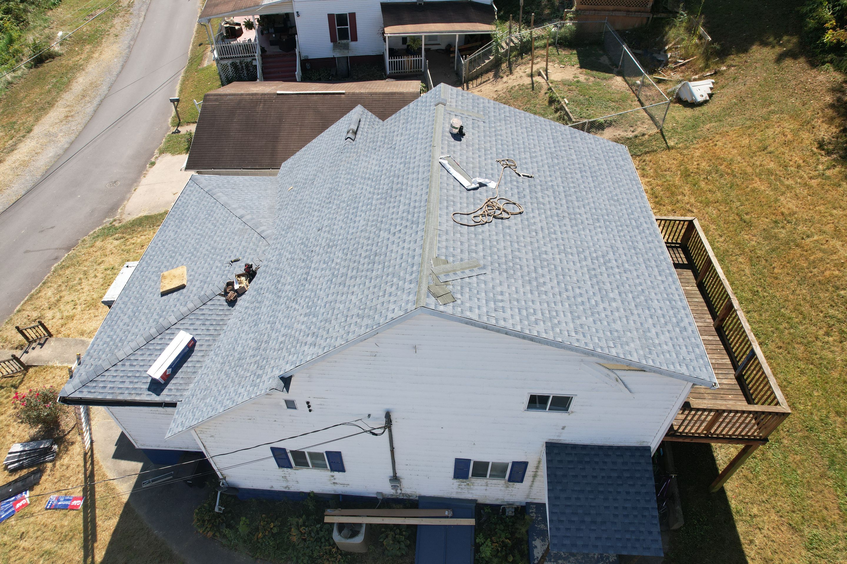 Residential Roofing Installation using GAF Timberline HDZ Biscayne Blue by Rainstoppers Roofing