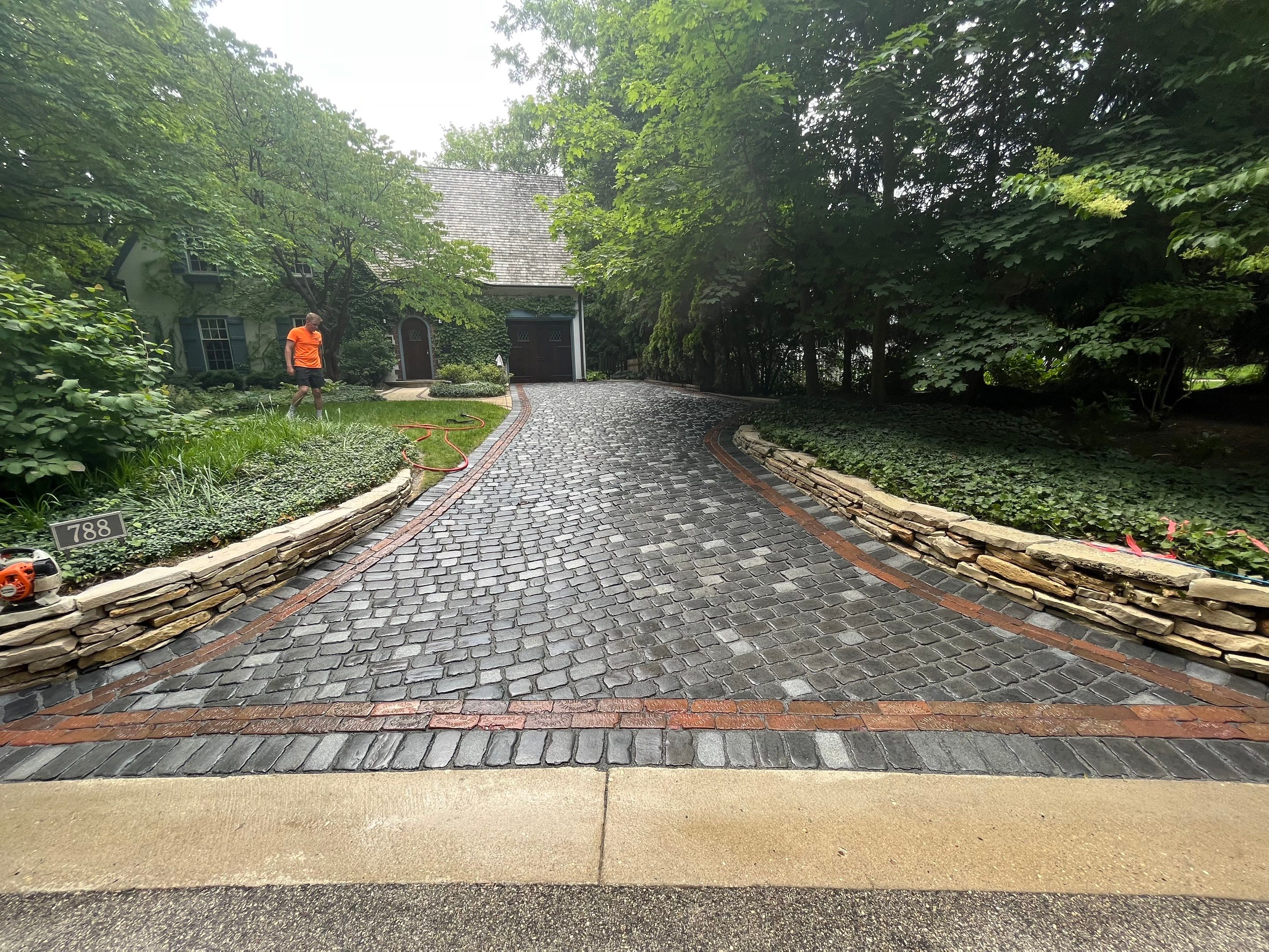 Glencoe, IL brick paver clean sand seal, repair, and reseal by Northern Power Washing LLC.