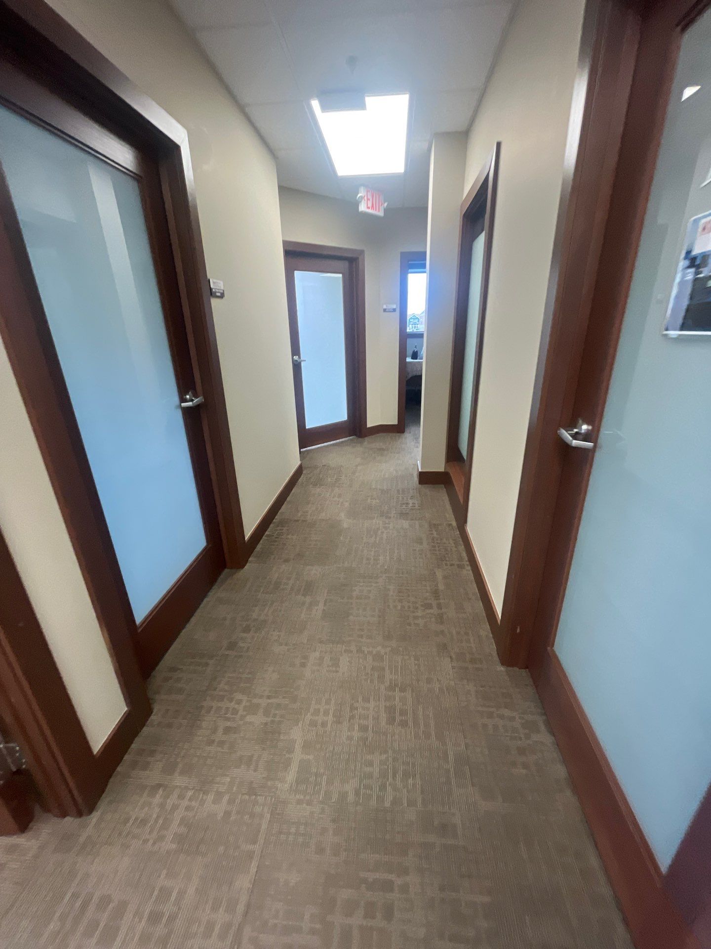 Commercial Office Interior Remodel and Modern Suite Refresh in Sioux Falls by Select Painting, Coatings & Garage Cabinets