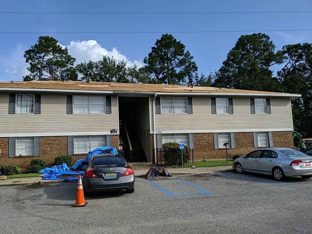 Residential Roofing Installation using Roof Replacement by American Roofing & Construction LLC