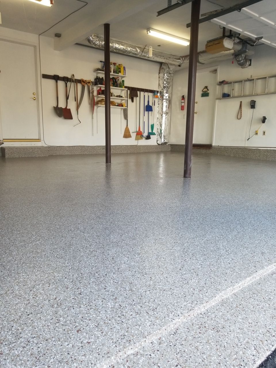Garage Floor Coating using Penntek in Pebble Beach by Spectrum Painting, LLC