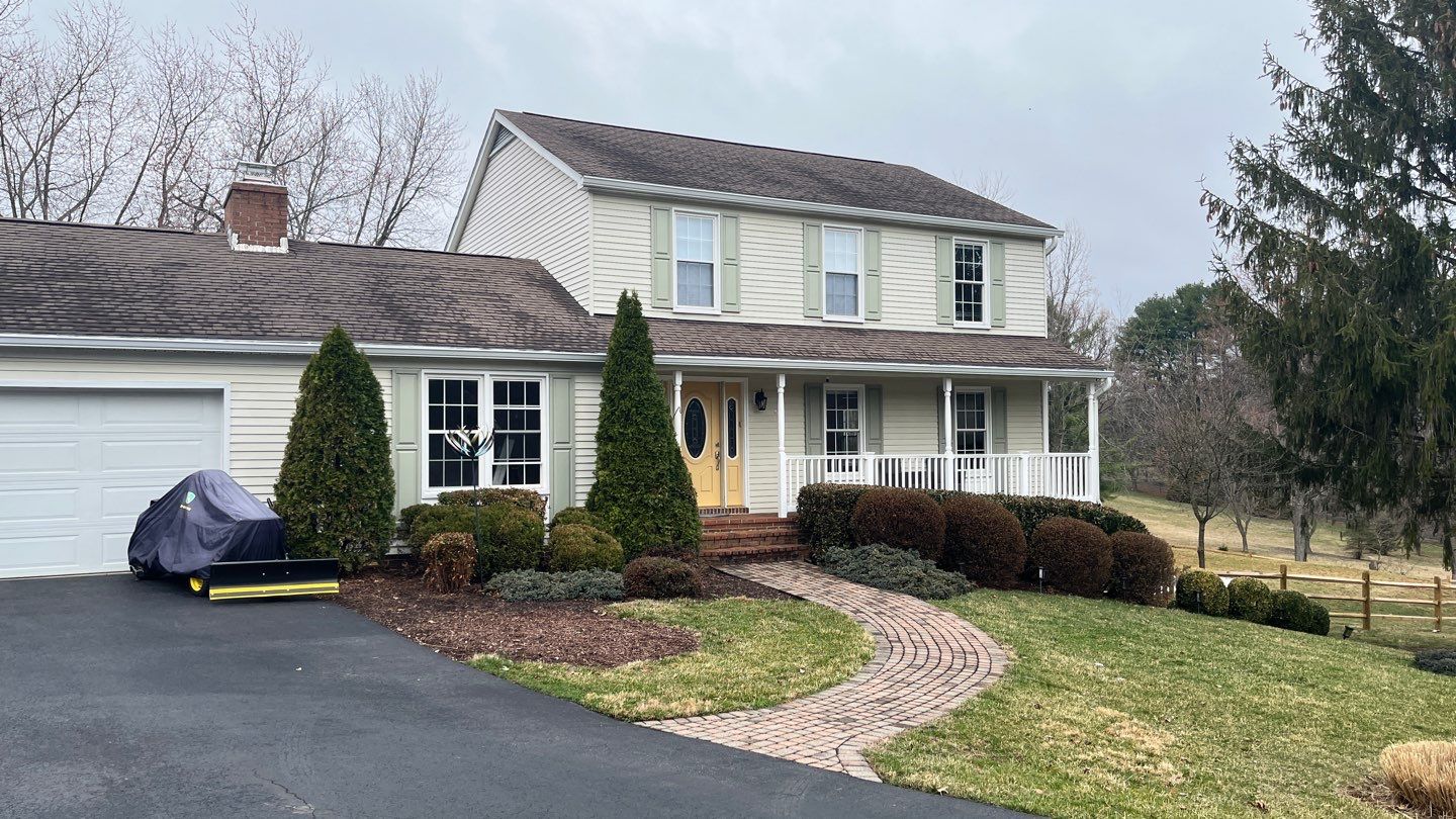 Residential Roofing Installation using Atlas Pinnacle Pristine Black Architectural Shingles by Frederick Roof Repair