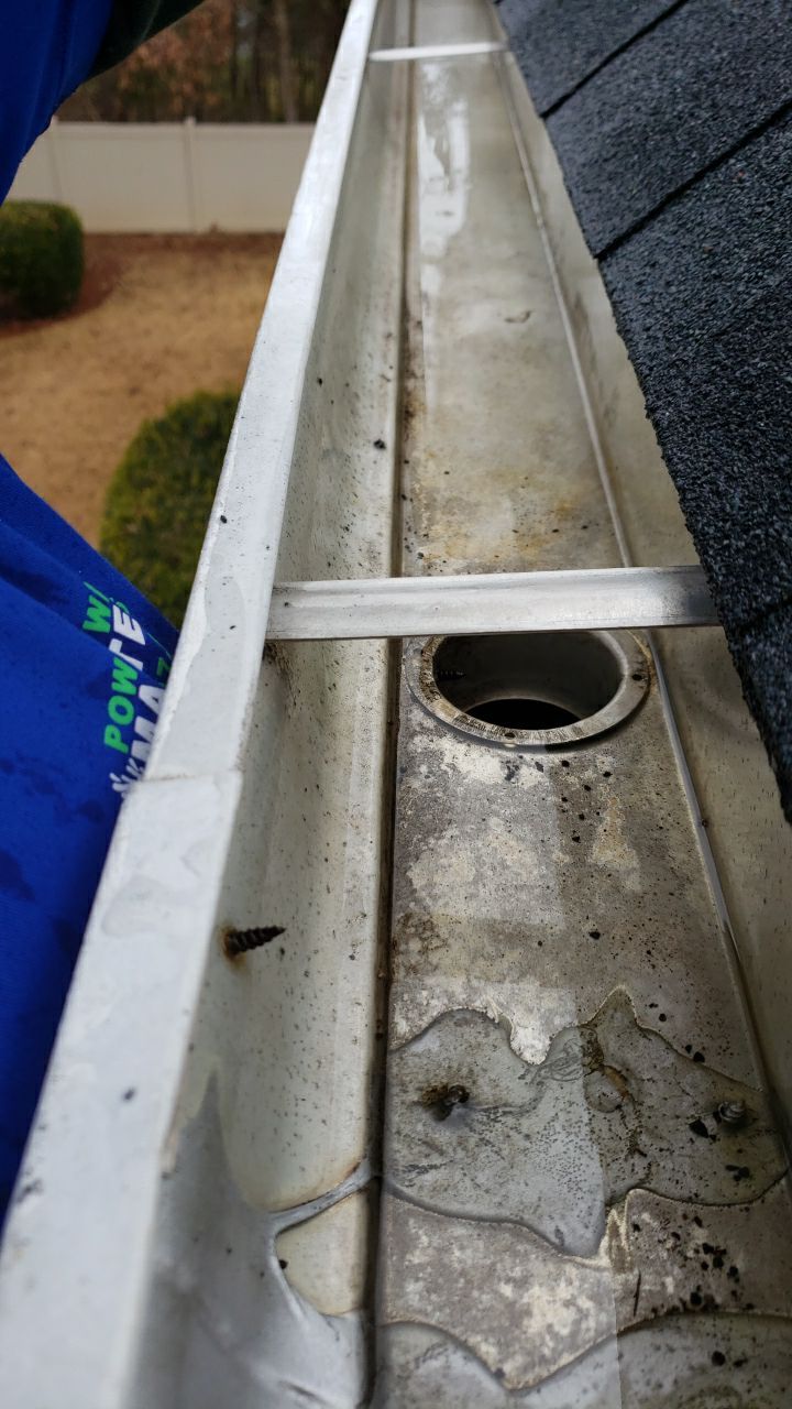 Gutter Cleaning using water by Power Wash Masters LLC