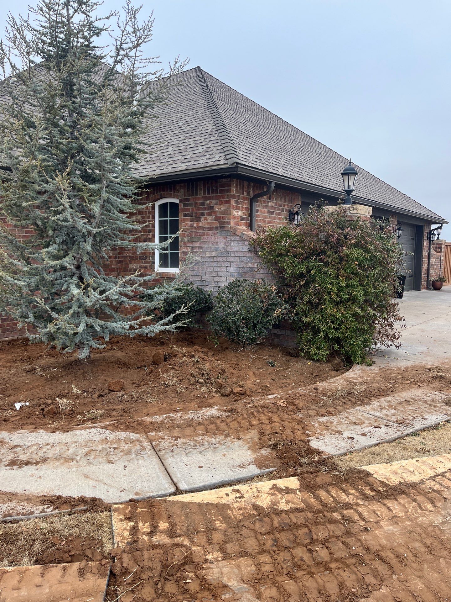 Landscape installation w/ irrigation and landscape lighting by Clays Services Inc