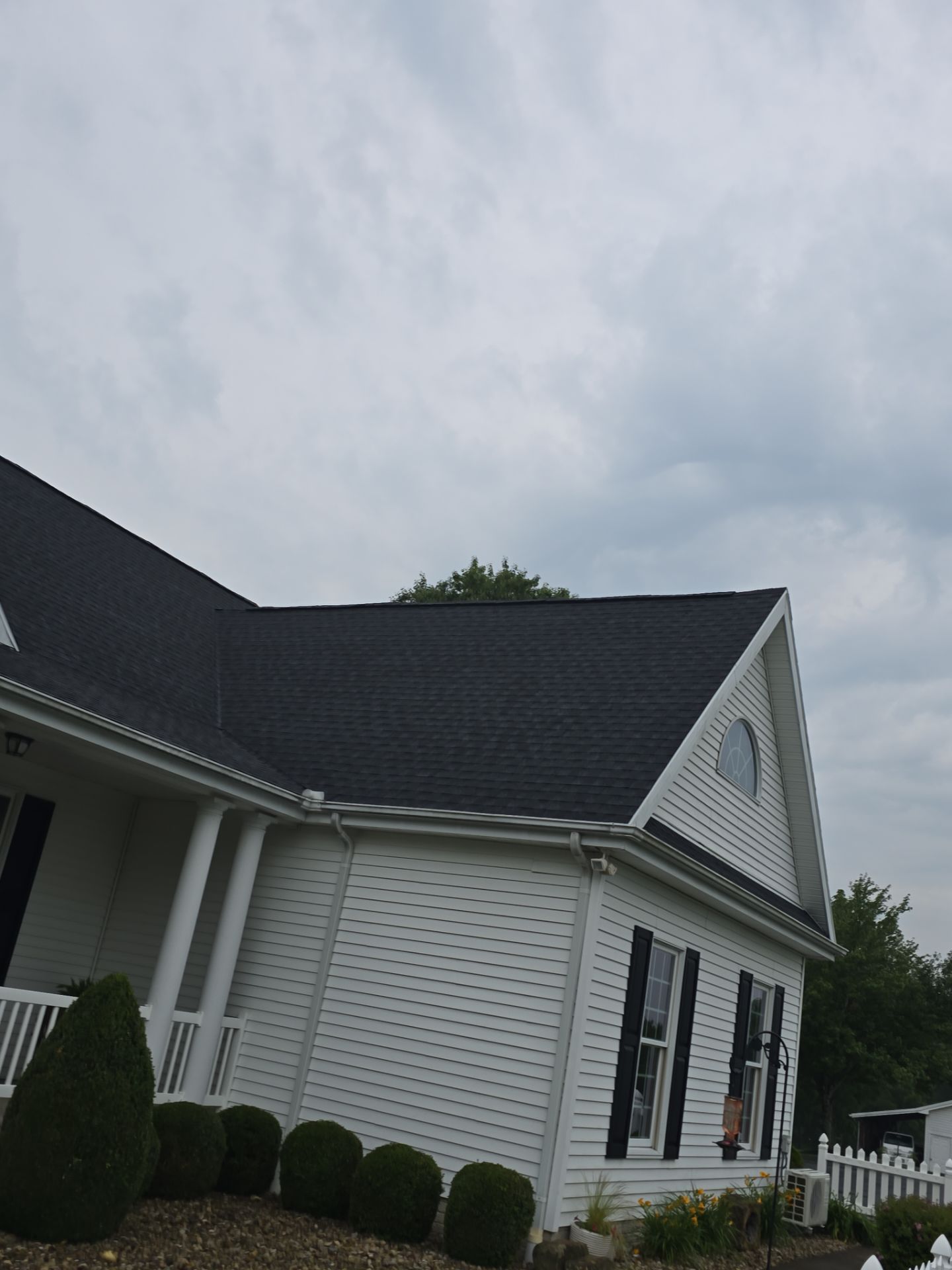 Residential Roofing Installation using GAF Timberline HDZ Charcoal by Rainstoppers Roofing