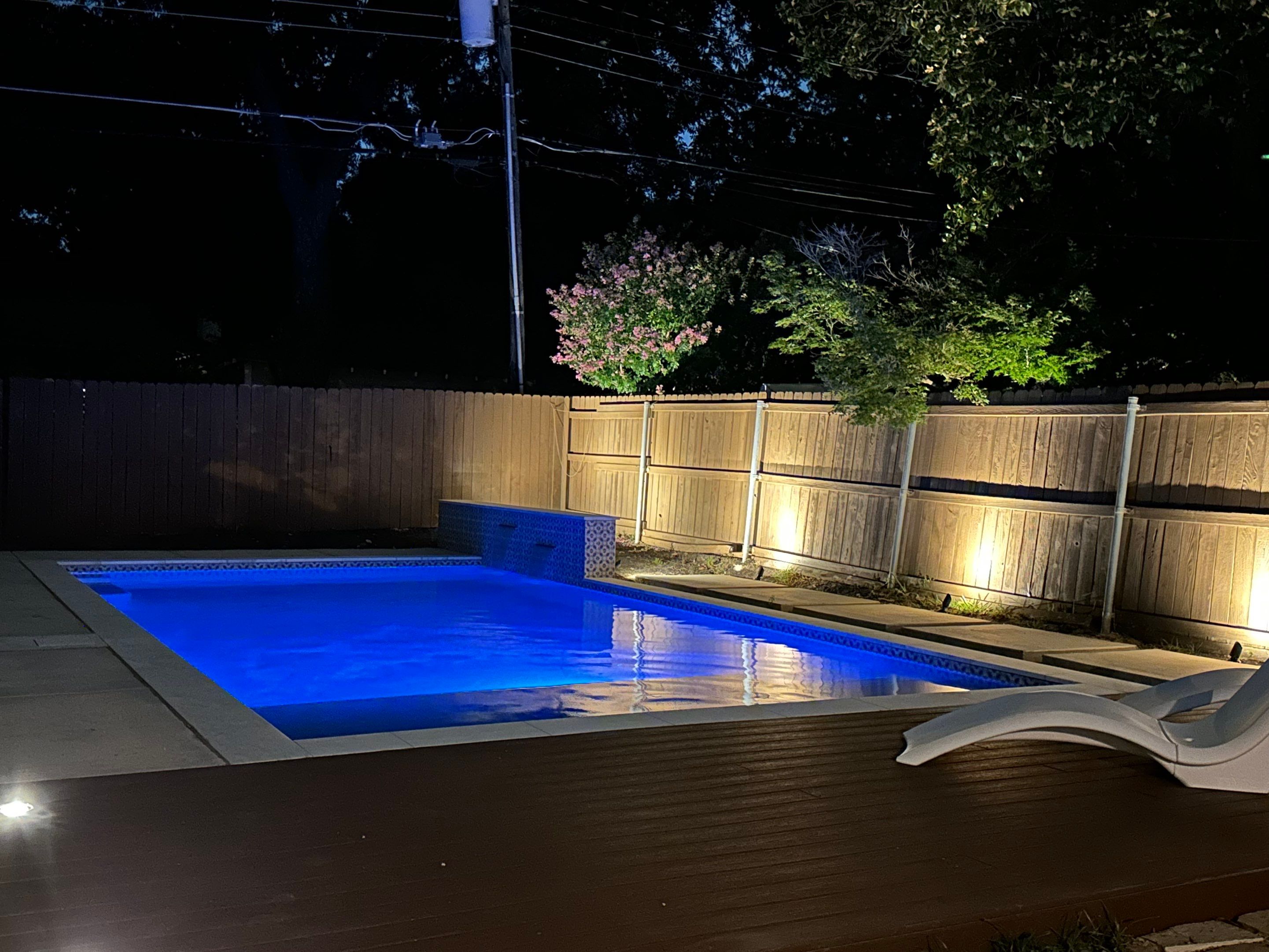 Modern Plunge Pool with Tiled Sheer-Descent Water Wall by Pinnacle Pools and Spas - DFW
