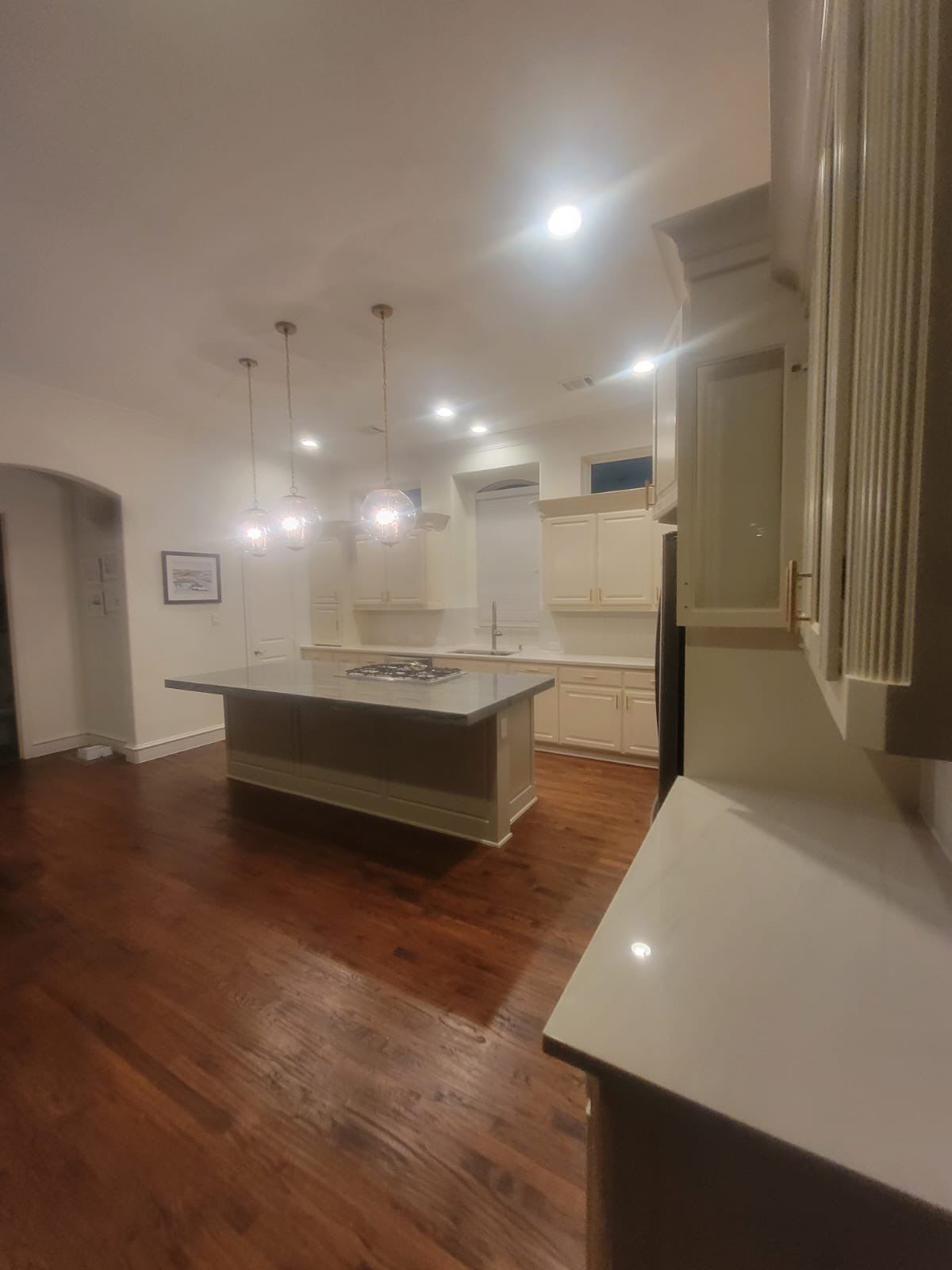 Kitchen Remodel using Quartzite by SLM General Contractors & Roofing
