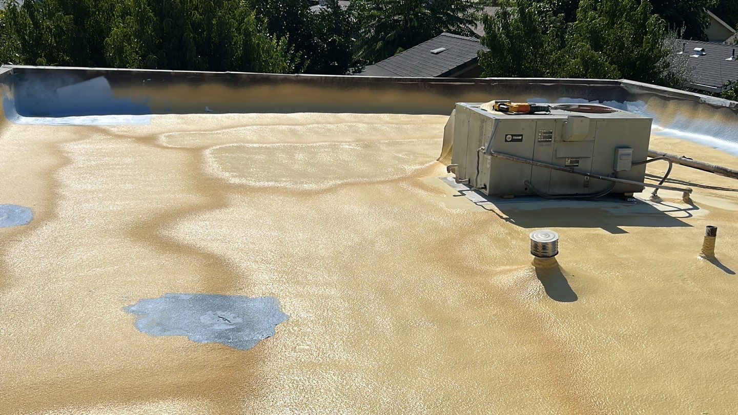 Foam Refurbish using Conklin Benchmark/PUMA XL coatings and spray foam; Also metal roofing around parapet wall by Straight Edge Roofing Inc