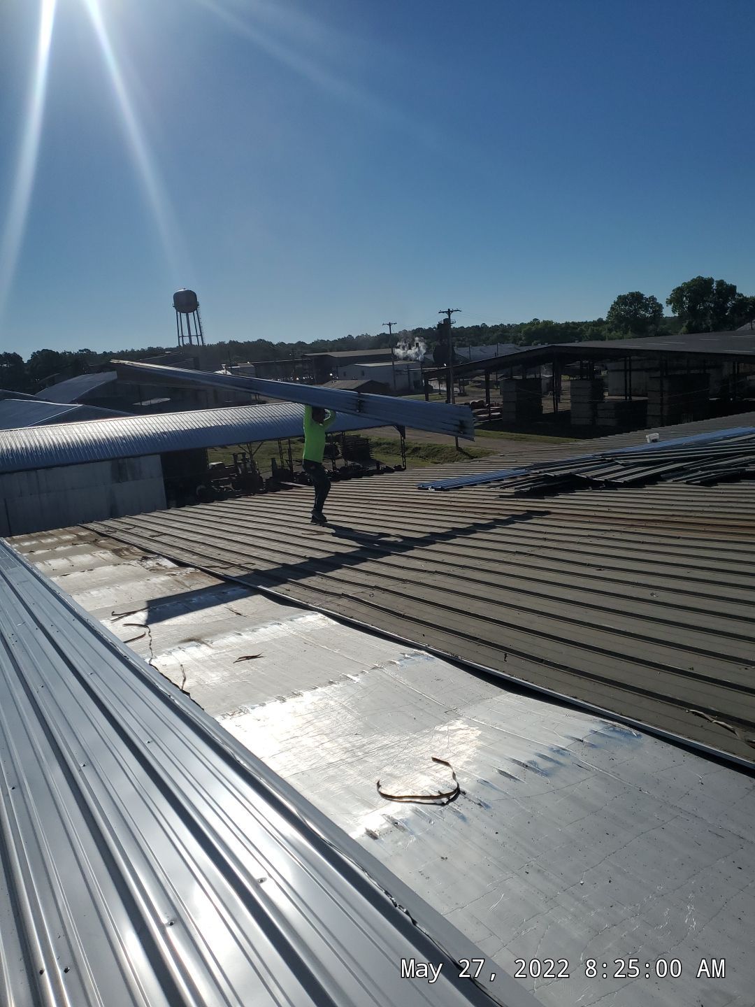 Commercial Roofing Installation using Aluminum Roofing panels by Hostetler Roofing