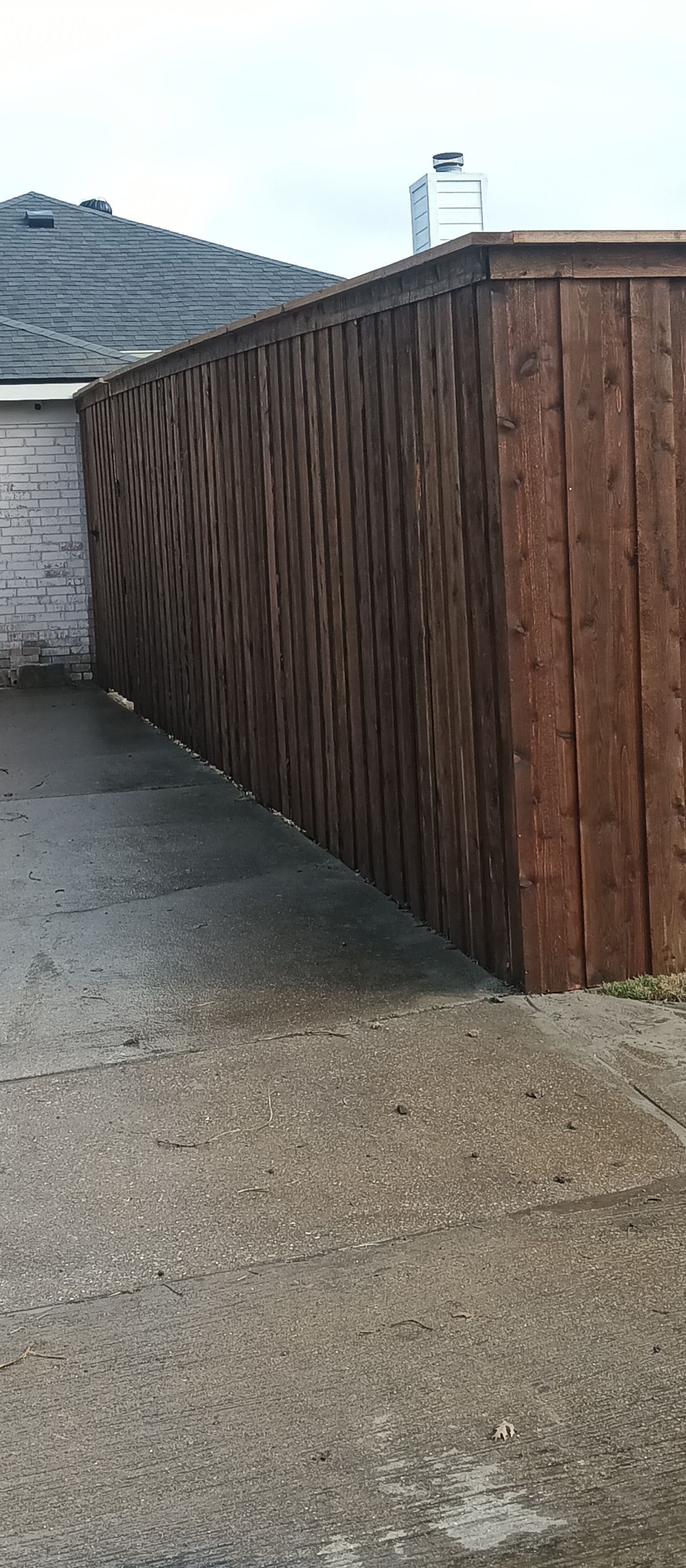 Pre-Stained 8' Board on Board cedar w/ trim and cap  by Grizzly Fence And Patio