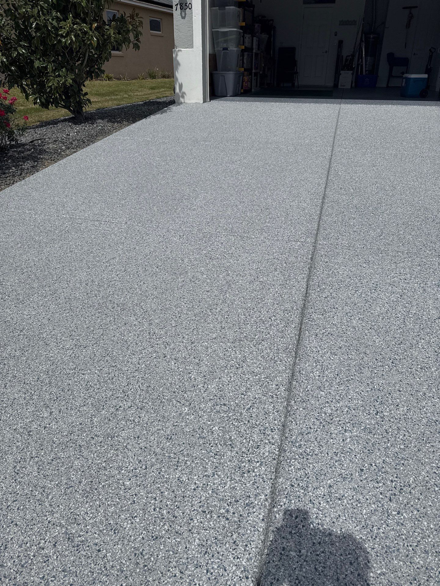 Driveway with Border Slatestone  by Innovative Concrete Coatings 