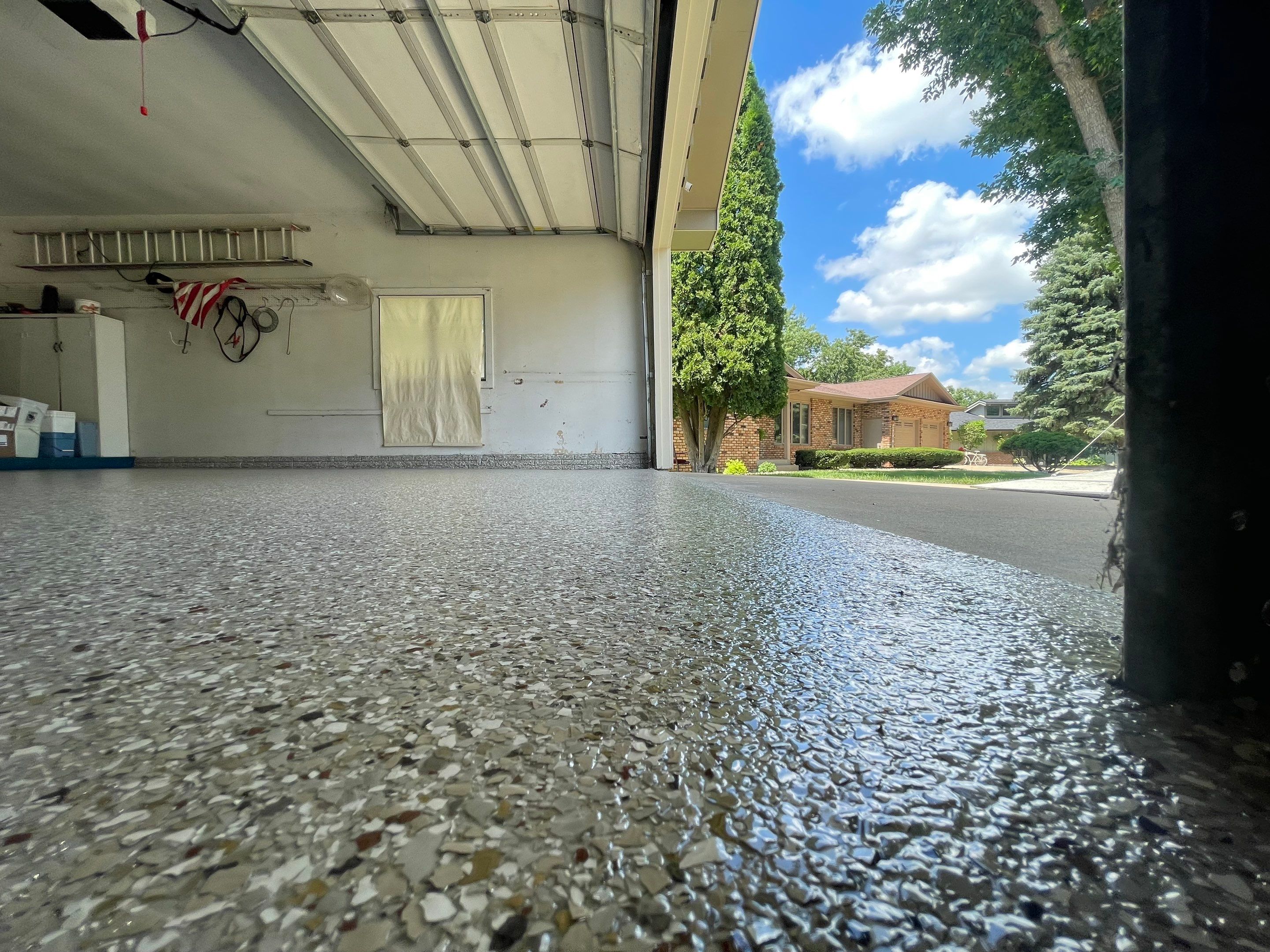 Custom Creekbed Garage Floor Coating in Sioux Falls by Select Painting, Coatings & Garage Cabinets