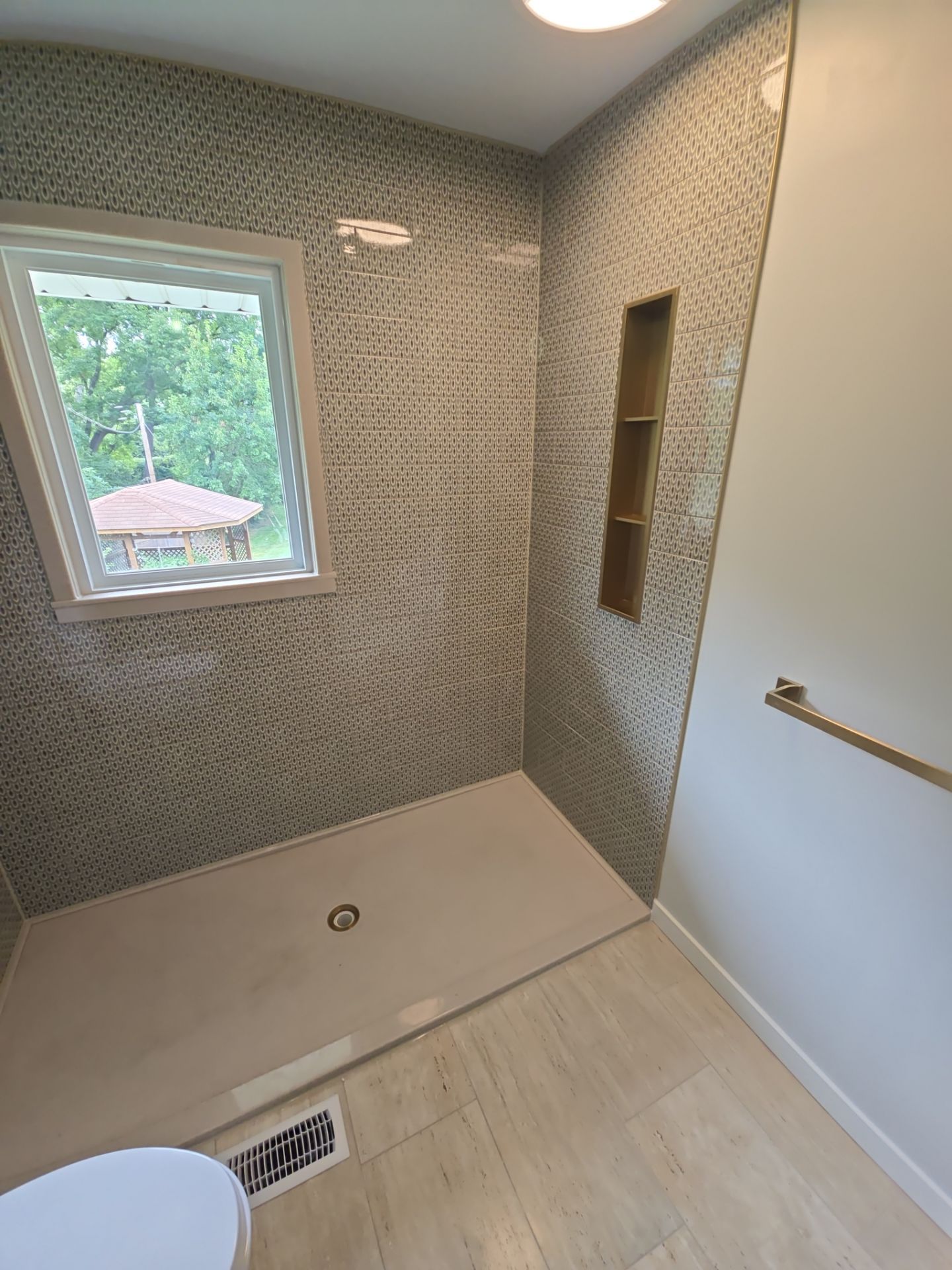 Full bathroom with custom tile by The Shower Company