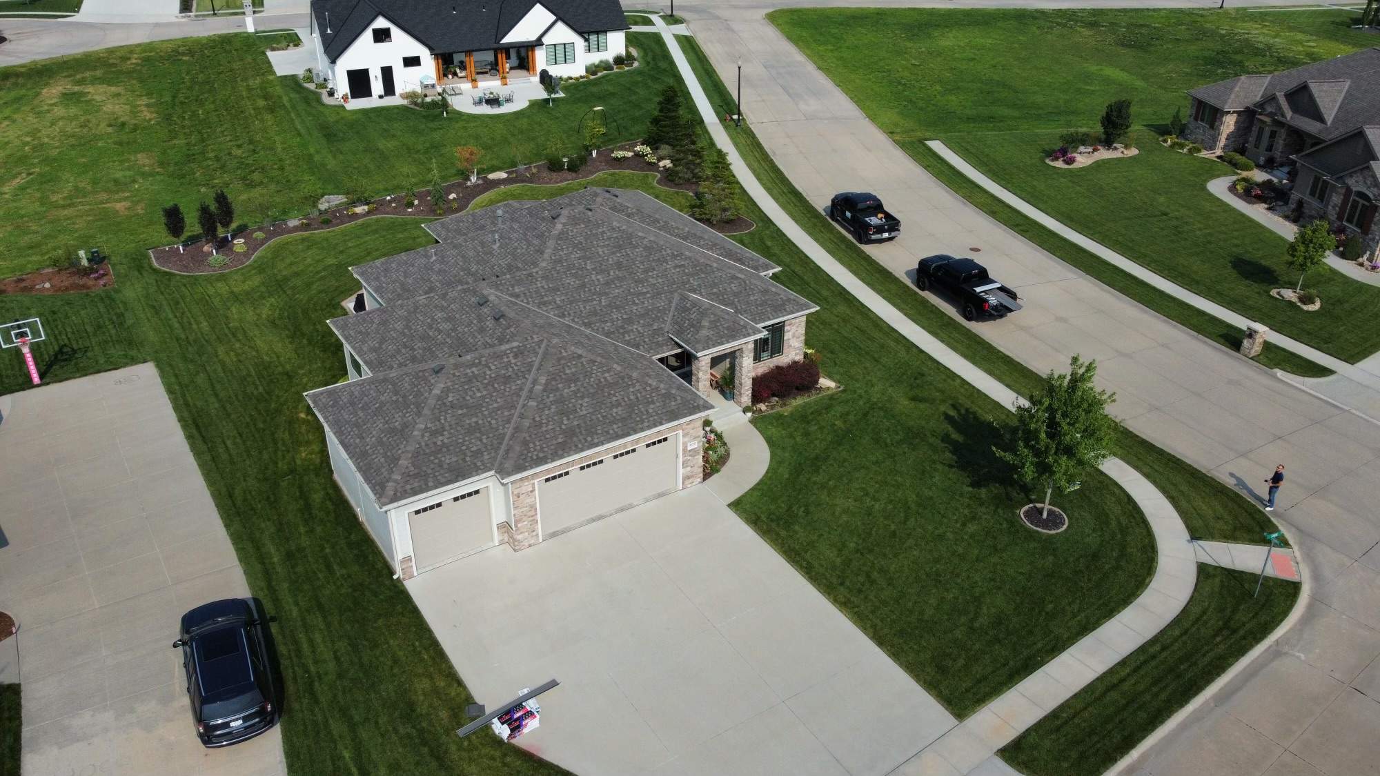 Residential Roofing Installation using TAMKO TITAN WEATHERED WOOD by Lightning Exteriors
