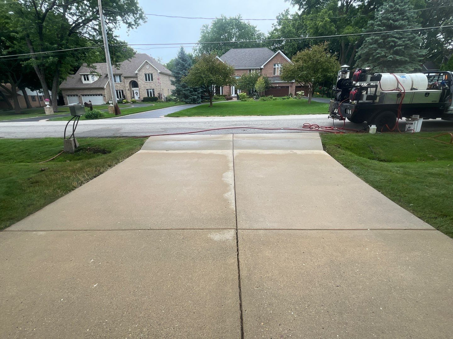 roof washing using Algaecide, soft wash soap by Northern Power Washing LLC.