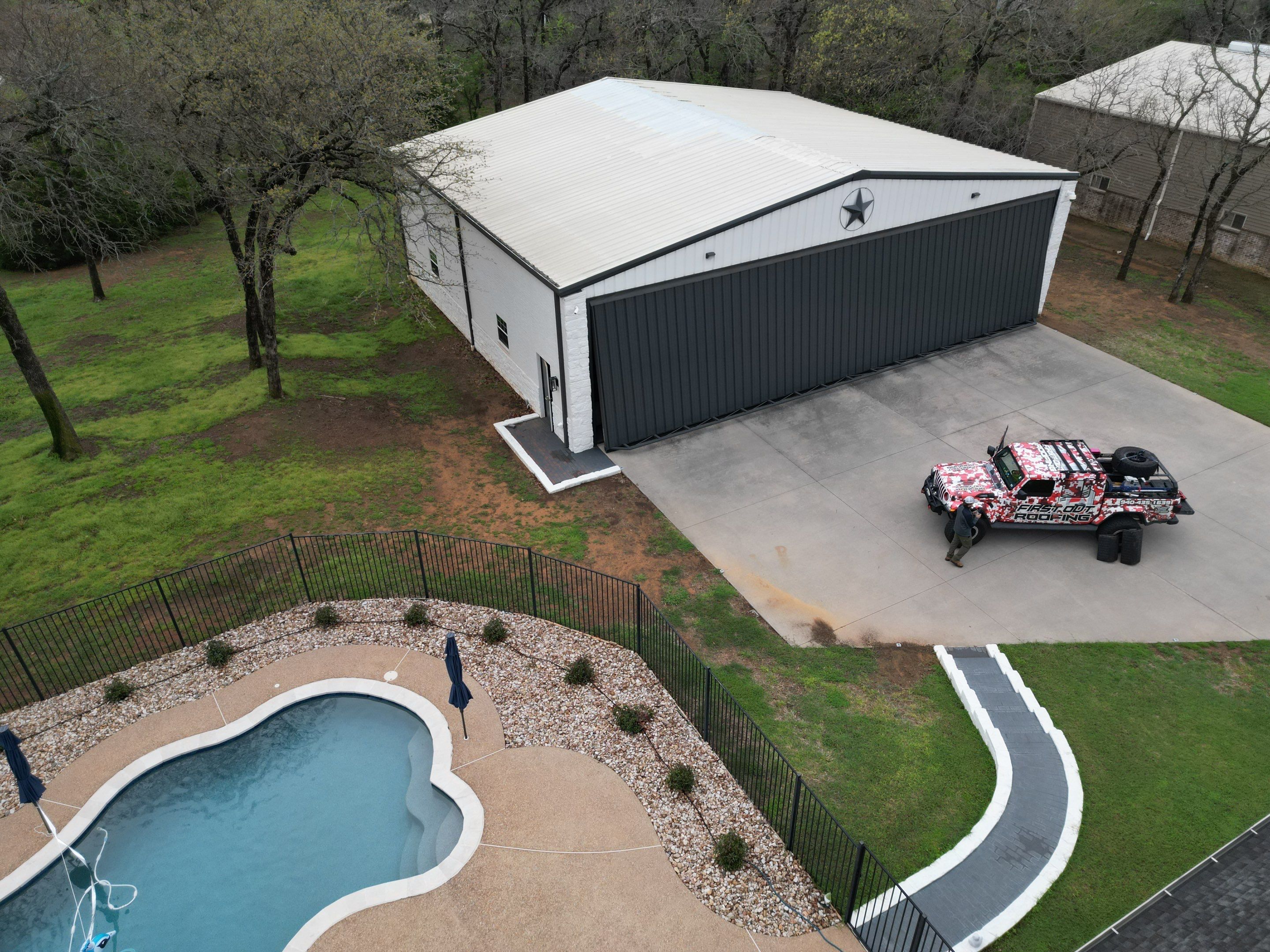 R-Panel Replacement by First Out Roofing 