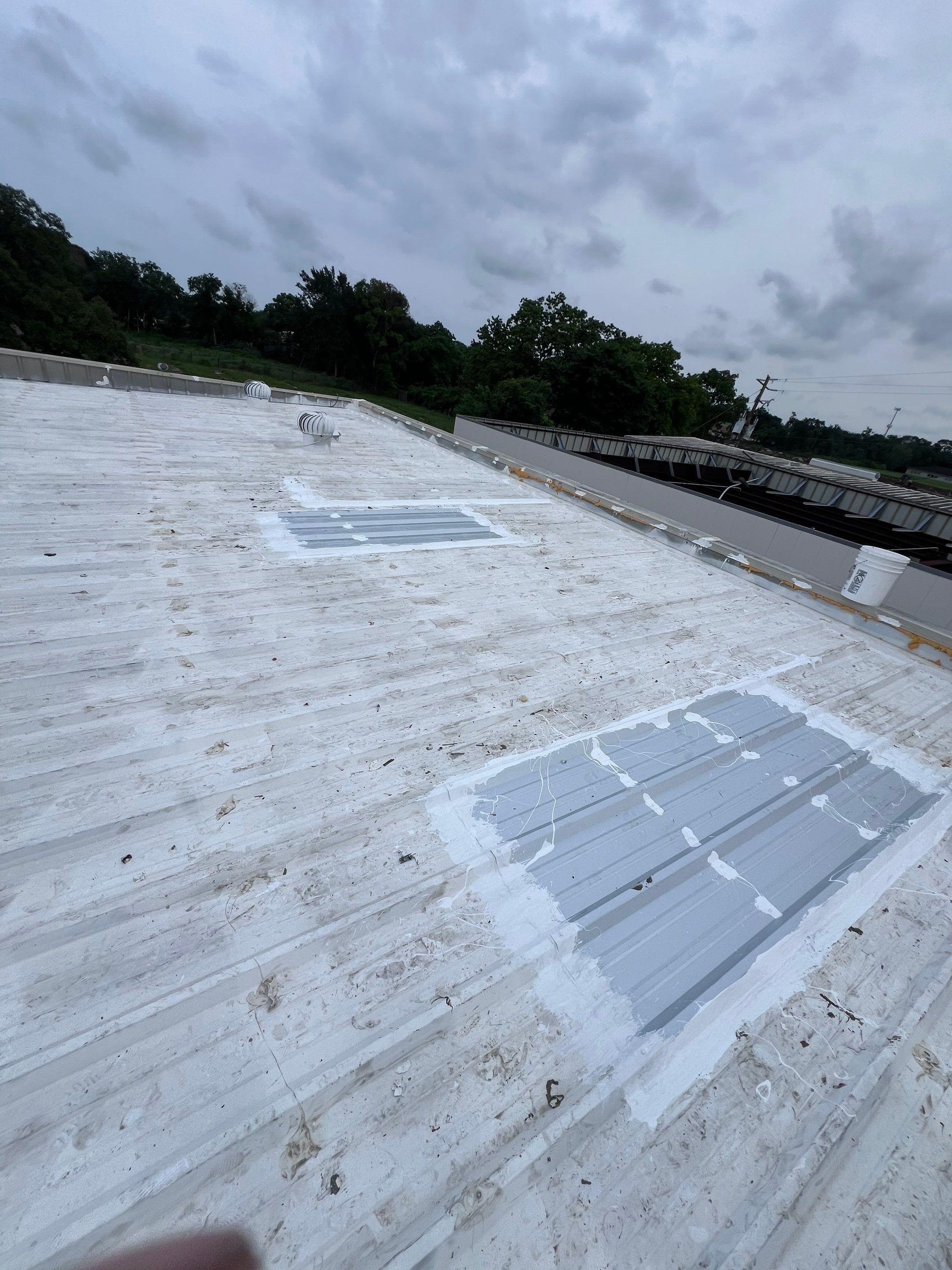 Commercial Roofing Repair using Metal by Roof Repair Company