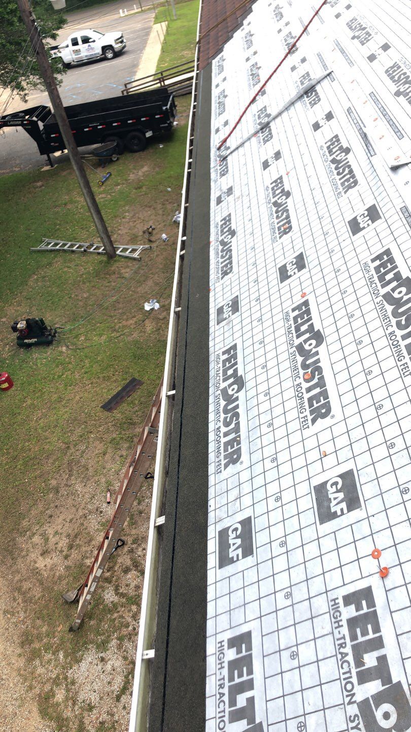 Residential Roofing Installation using Roof Replacement by American Roofing & Construction LLC