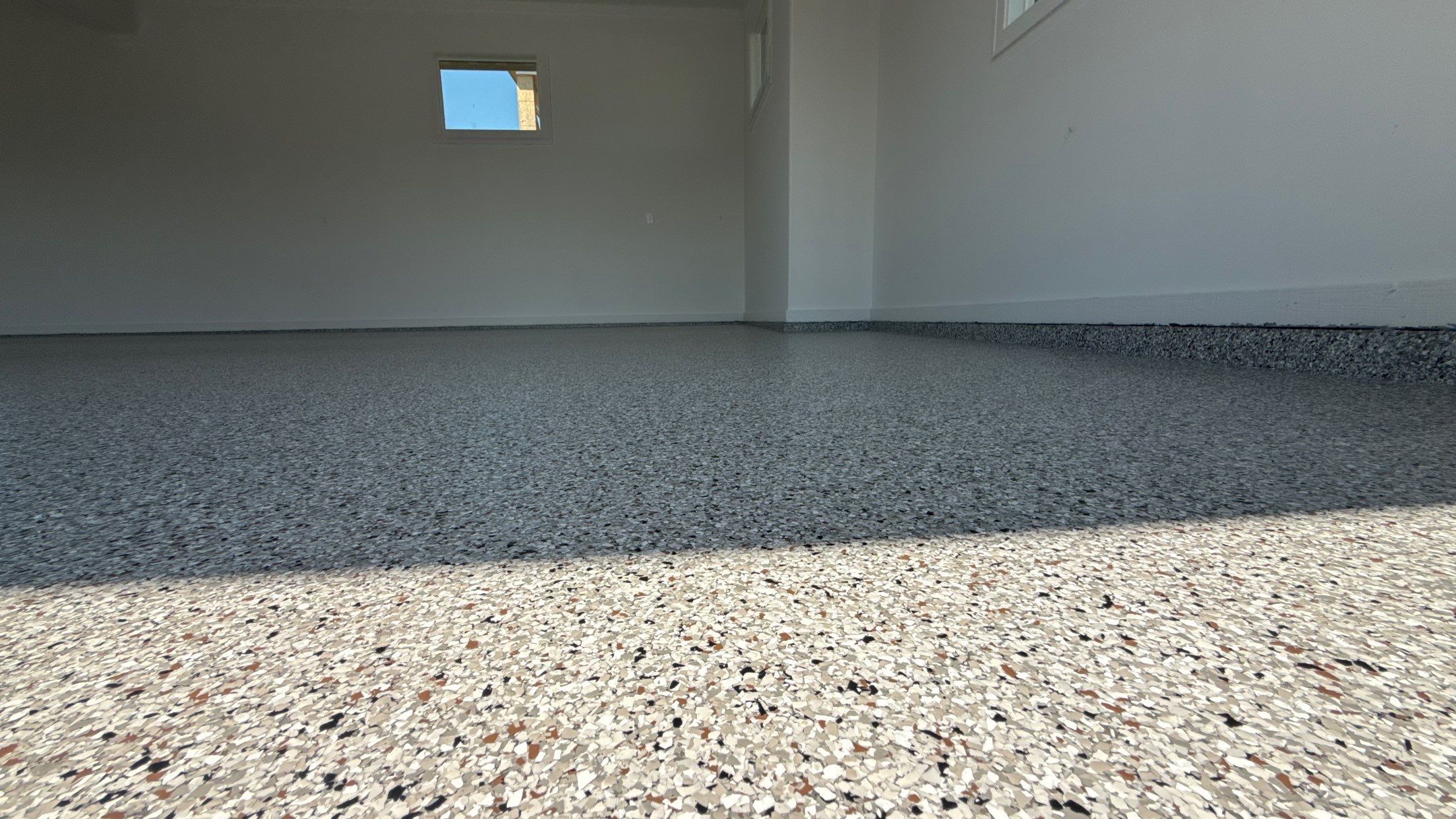Custom Garage Epoxy Flake Floor Coating in Leawood by Banner Garage