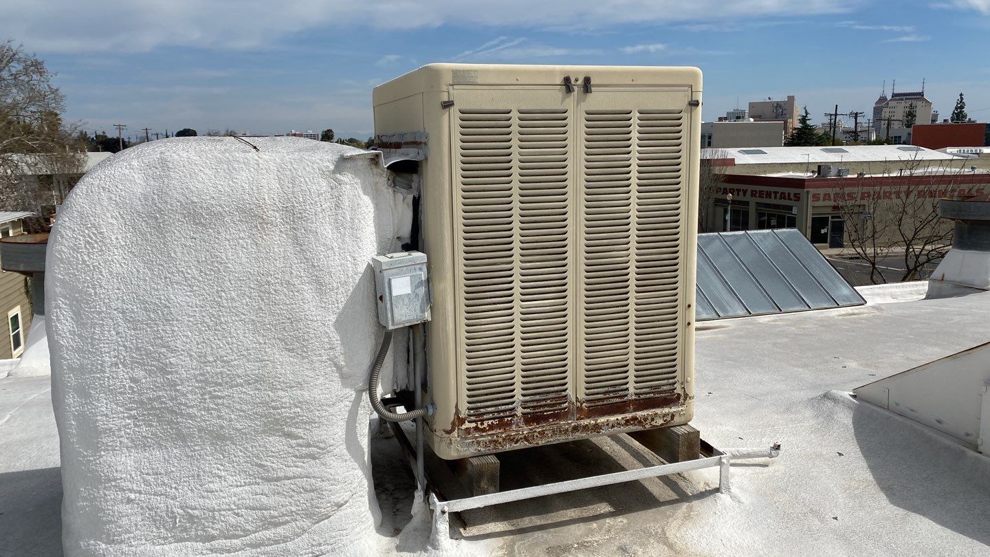Polyurethane foam roof refurbish and recoating by Straight Edge Roofing Inc
