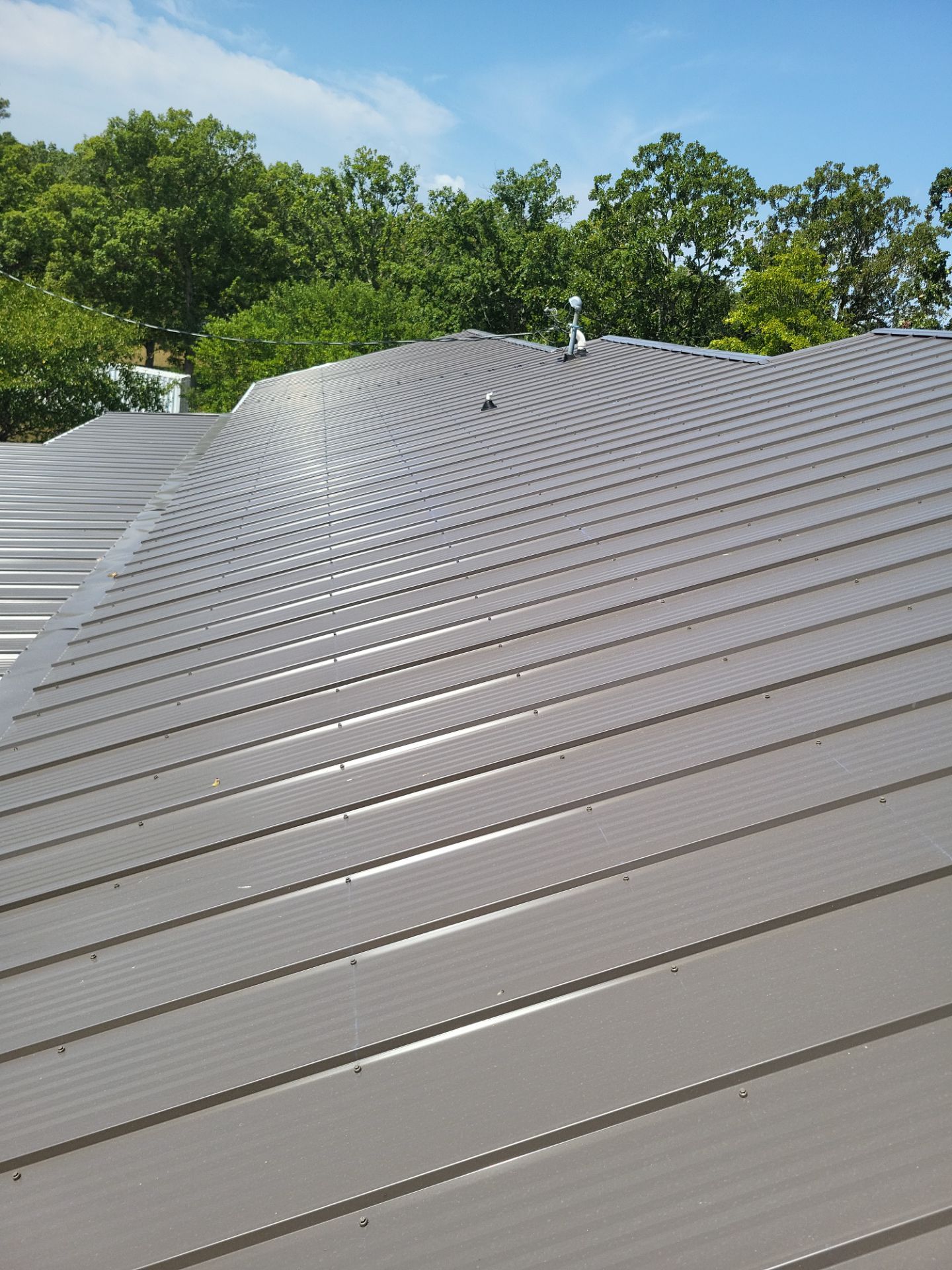 Residential Roof + Gutters & Downspouts & Gutter Covers Install  by Titan Commercial & Residential Roofing 