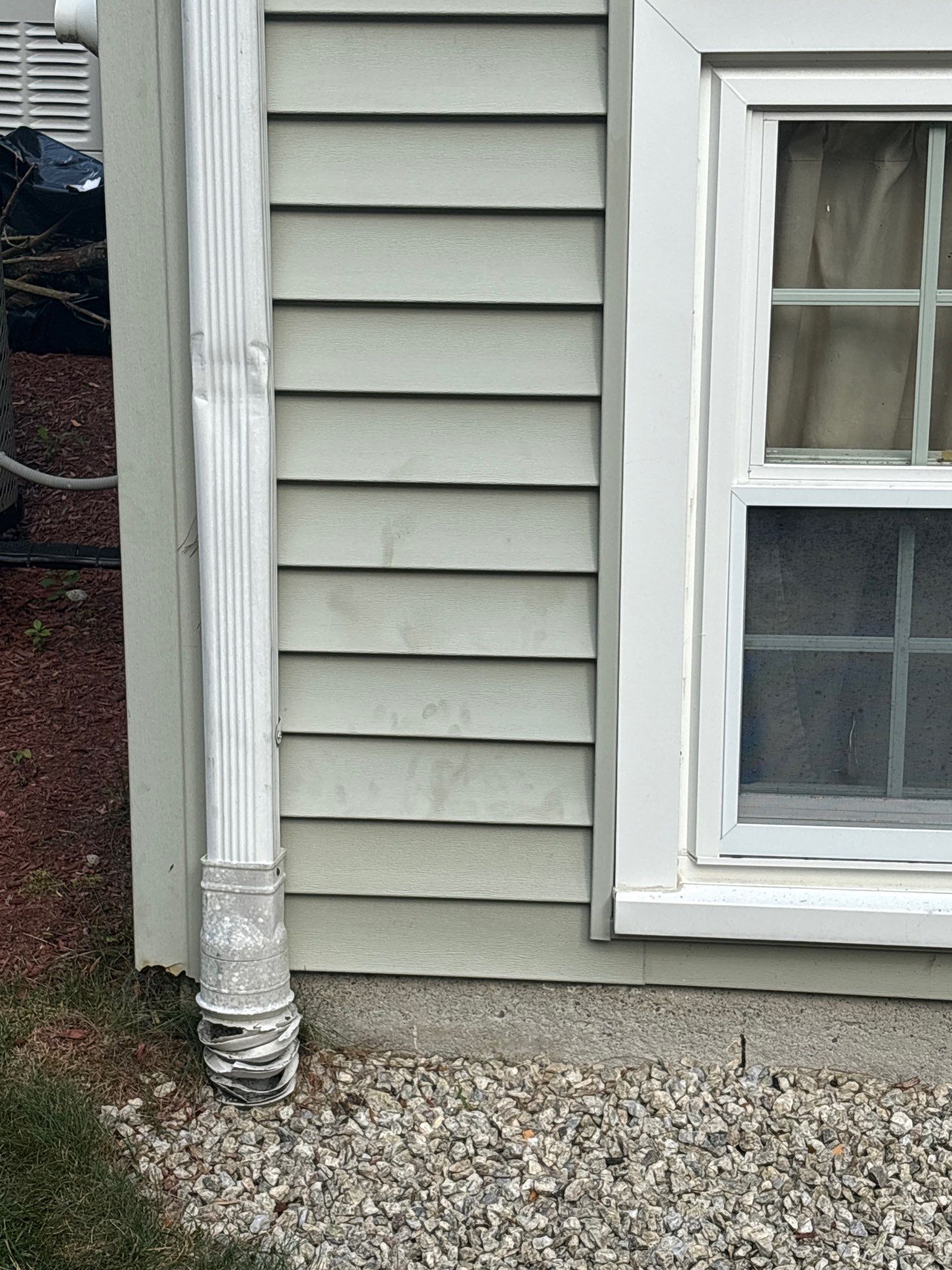 Complete Roof Replacement with Chimney Flashing, Gutter Guard System, and Vinyl Siding Repairs by Mighty Dog Roofing of Greater Middlesex County