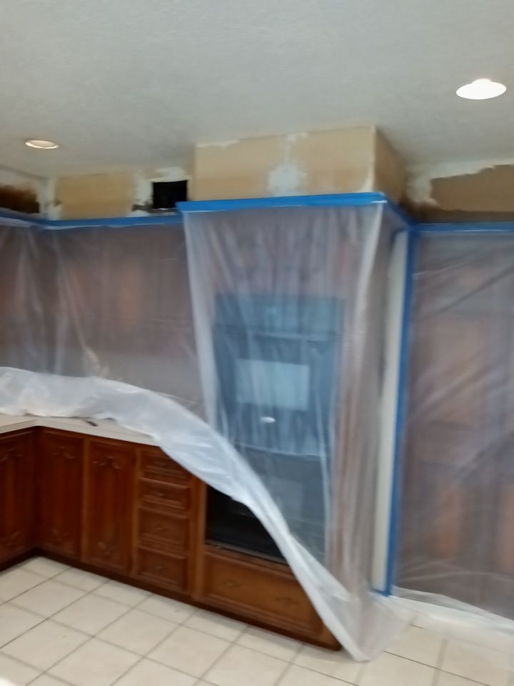Interior and exterior painting project by Roof Concepts Construction