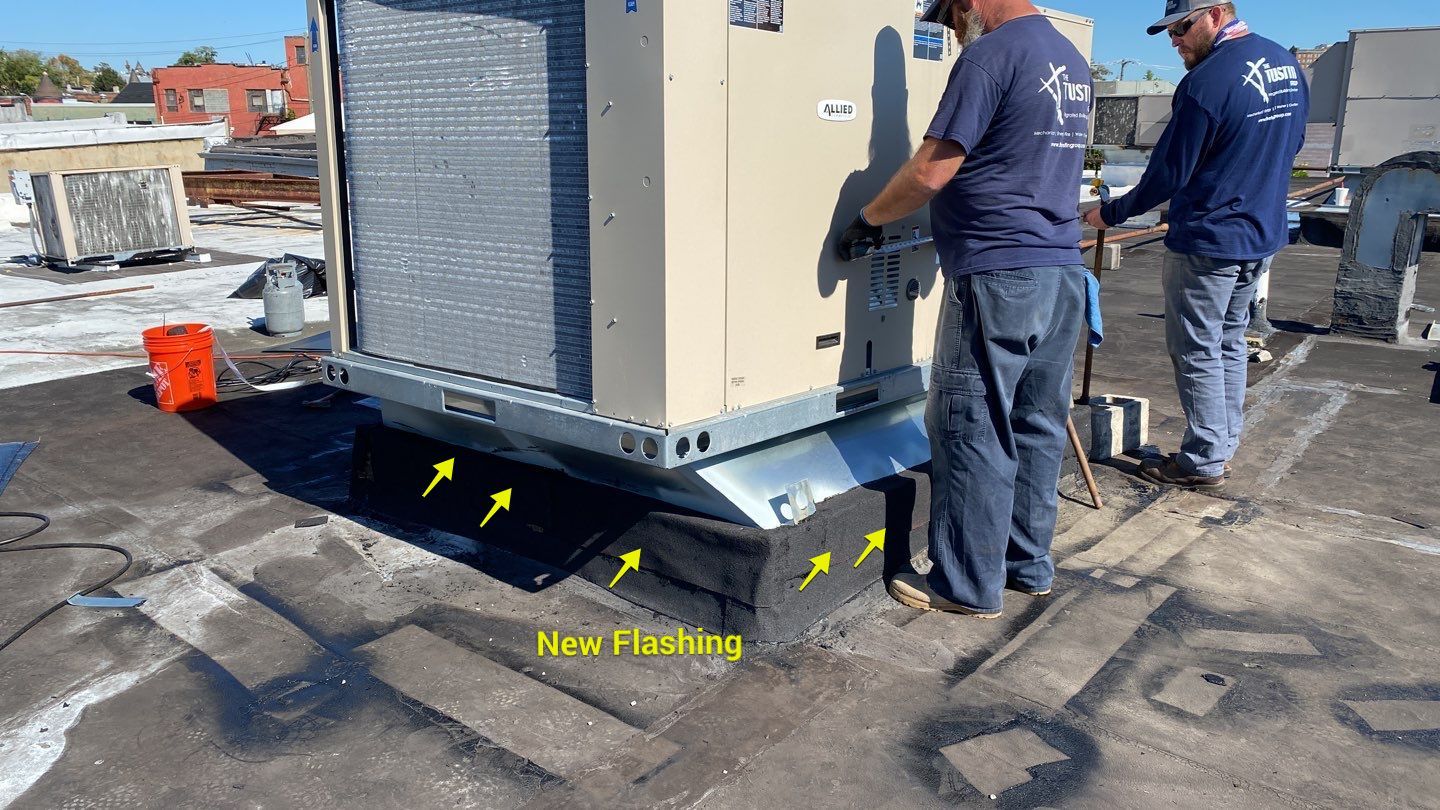 Commercial Roofing Repair using new Flashing by Alpha Design Services