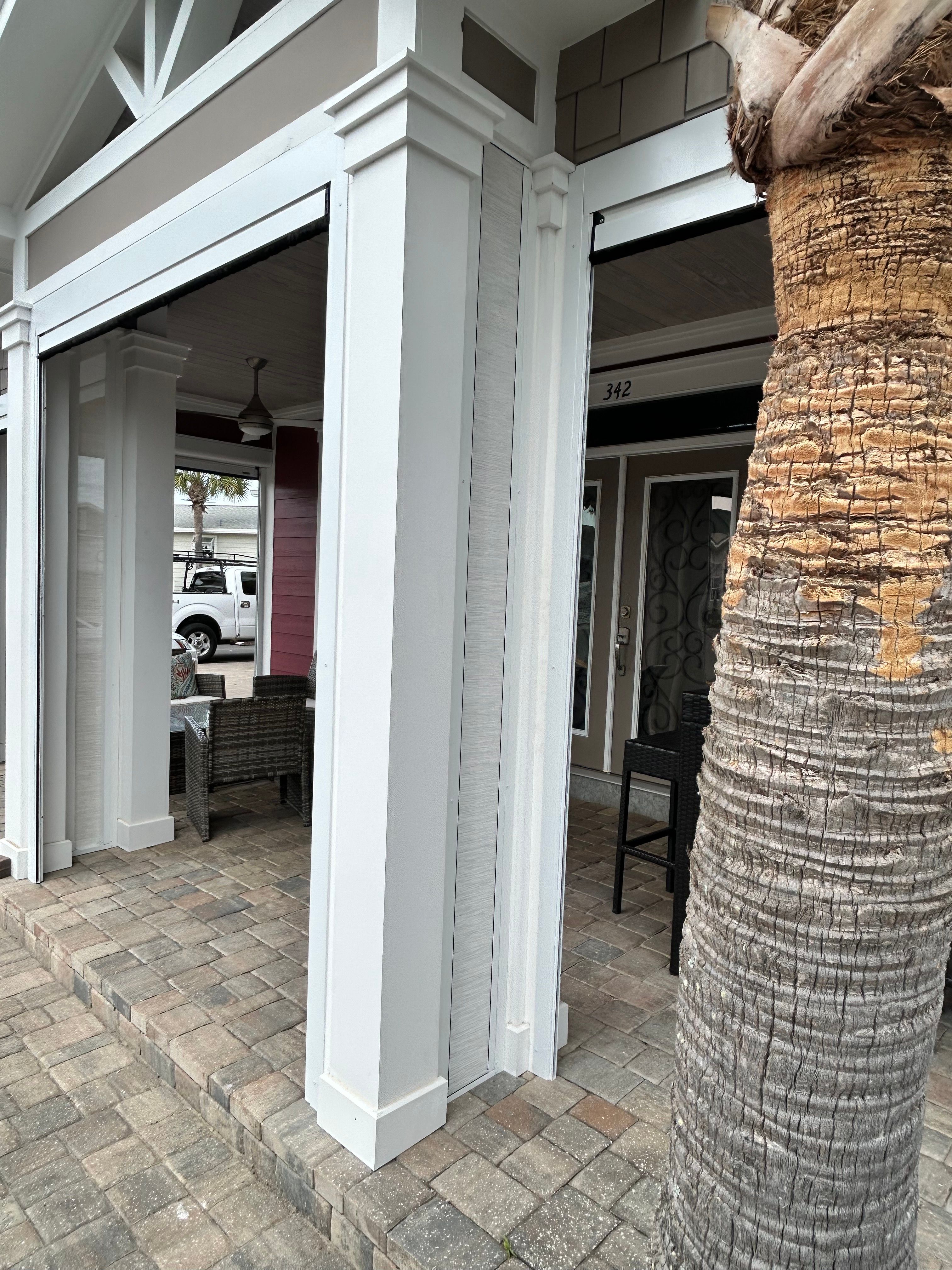 Fenetex Motorized Screen and Hurricane Shutter Installation in Panama City Beach by Brannan Aluminum Inc.