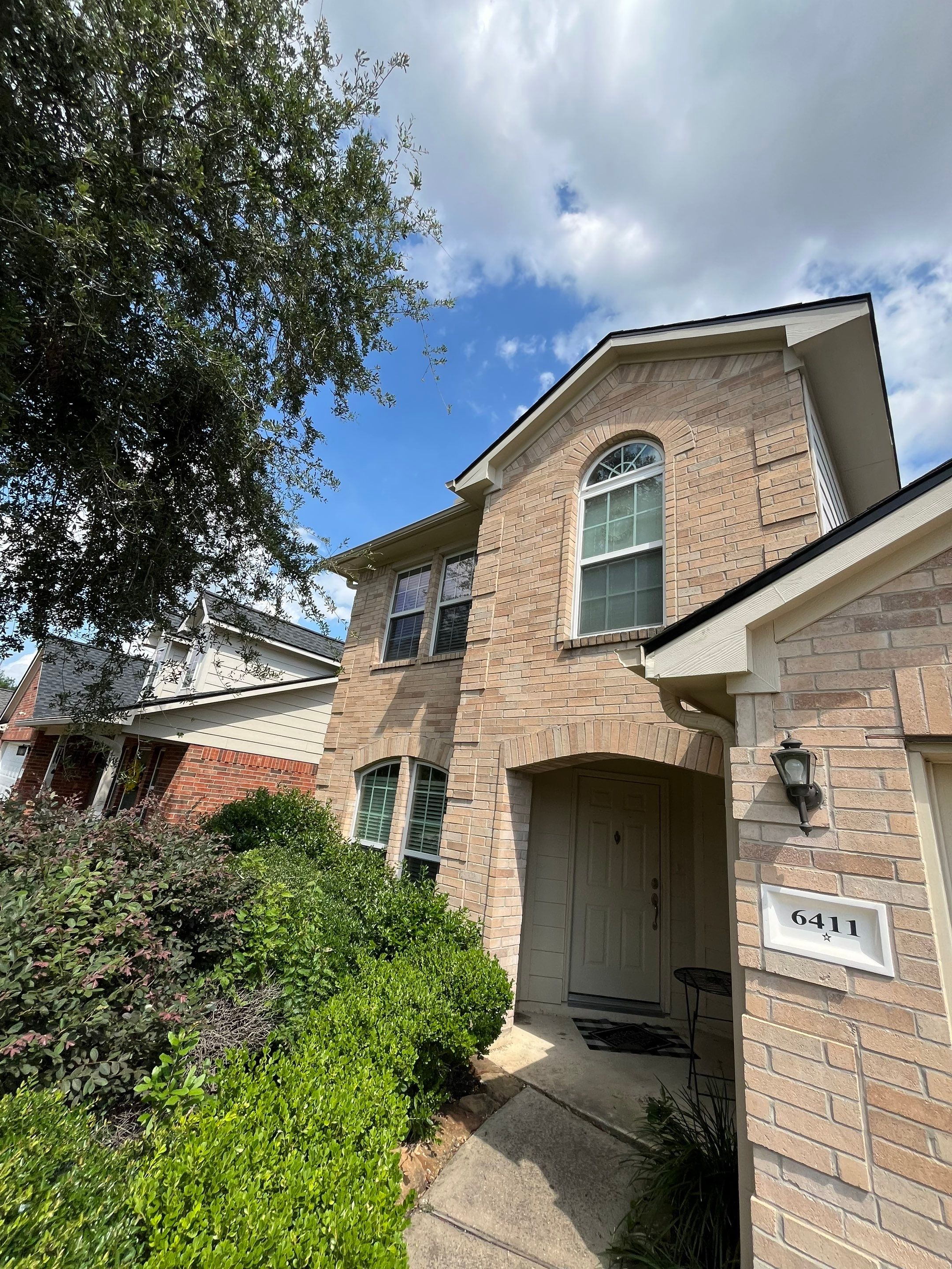Residential Reroof and Exterior Window Project by Roofing Technologies Unlimited