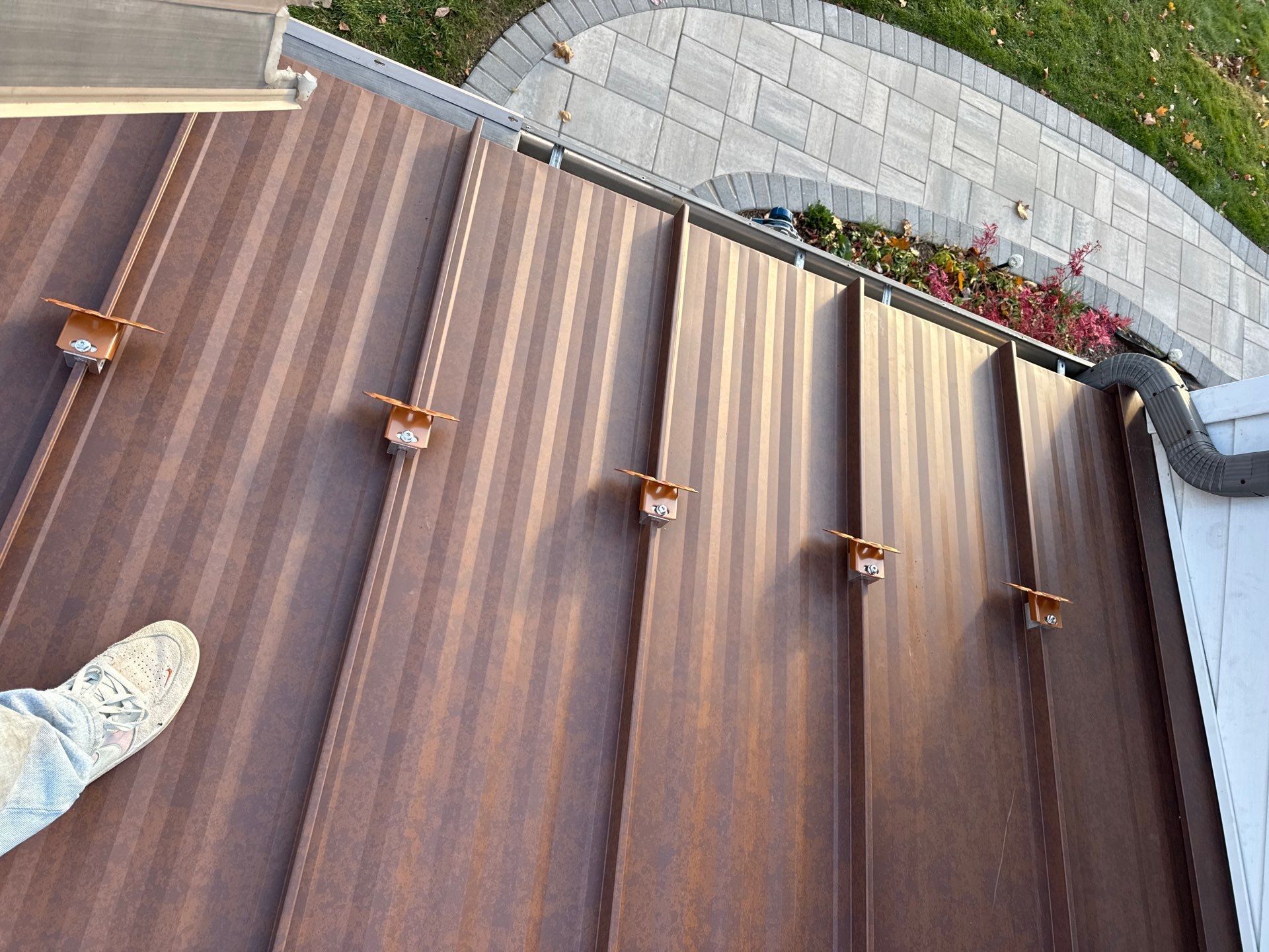 Roof Replacement using MS Standing Seam Roof Western Rust by 180 Contractors